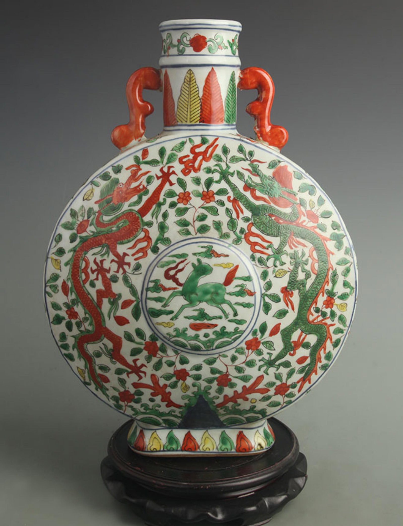 DOUBLE DRAGON WUCAI MOON STYLE PORCELAIN VASE: Ming Dynasty Style Wan Li Period: High: 15.8 inch; Diameter: 11.0 inch; wooden base for picture and display purpose only.