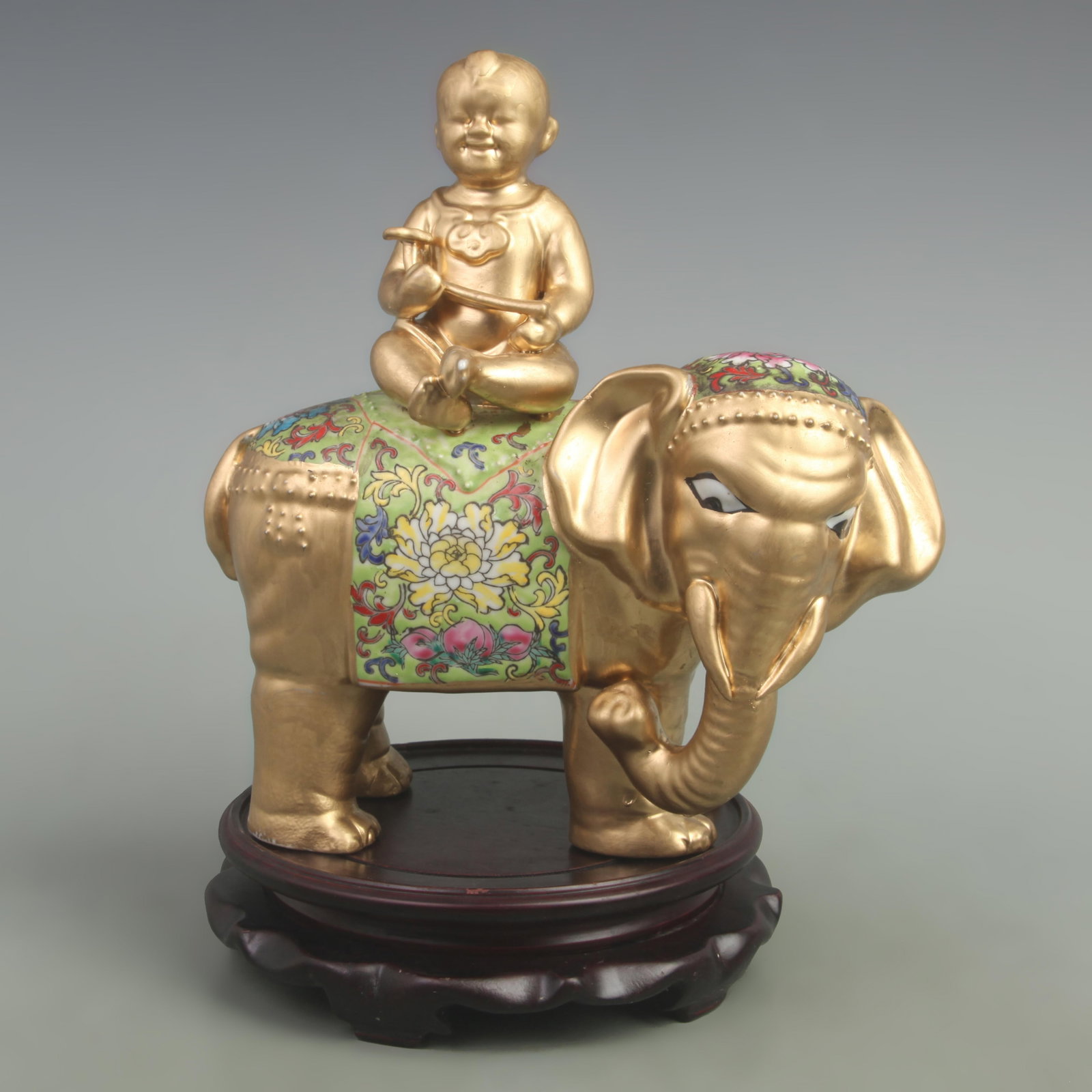 FAMILLE ROSE ELEPHANT WITH BOY PATTERN STATUE DECORATION: Qing Dynasty Qian Long Period; Diameter: High: 10 inch; High: 10.5 inch; wooden base for picture and display purpose only.