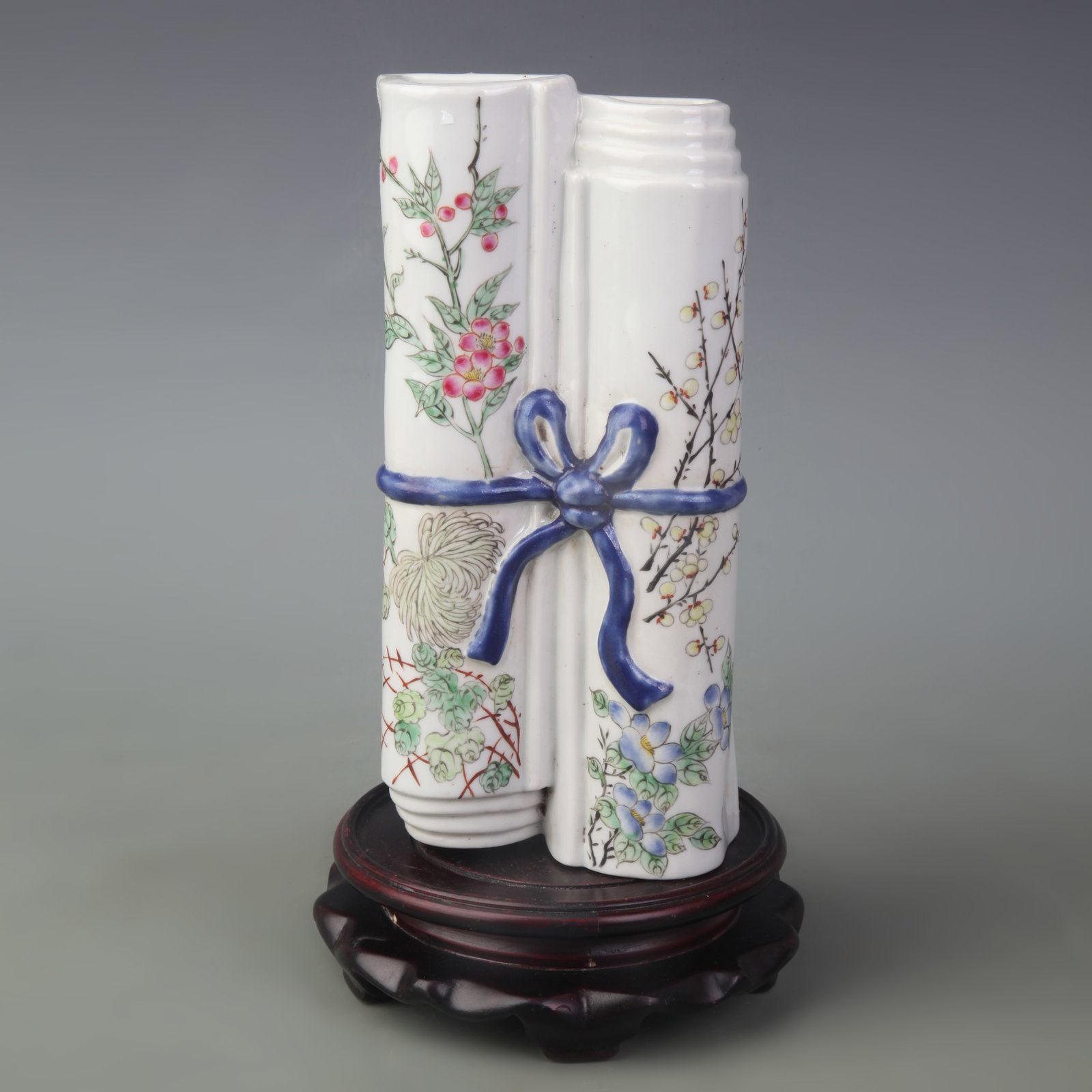 A FAMILLE-ROSE FLORAL WALL HANGING PORCELAIN VASE: Republic Period; Long: 8.0 inch; High: 3.5 inch ; wooden base for picture and display purpose only.