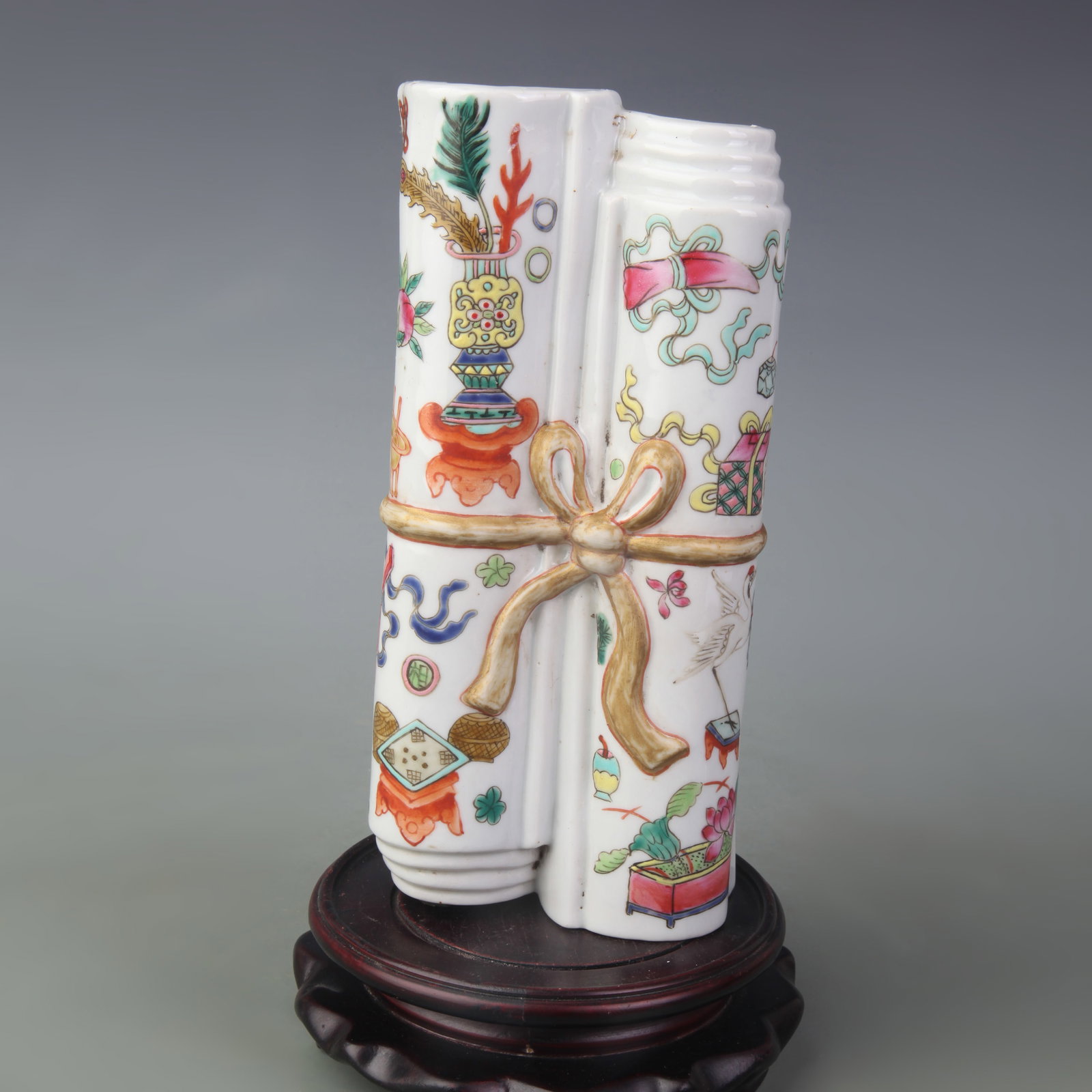A FAMILLE ROSE EIGHT TREASURES WALL HANGING PORCELAIN VASE: Republic Period; Long: 8.0 inch; High: 3.5 inch ; wooden base for picture and display purpose only.