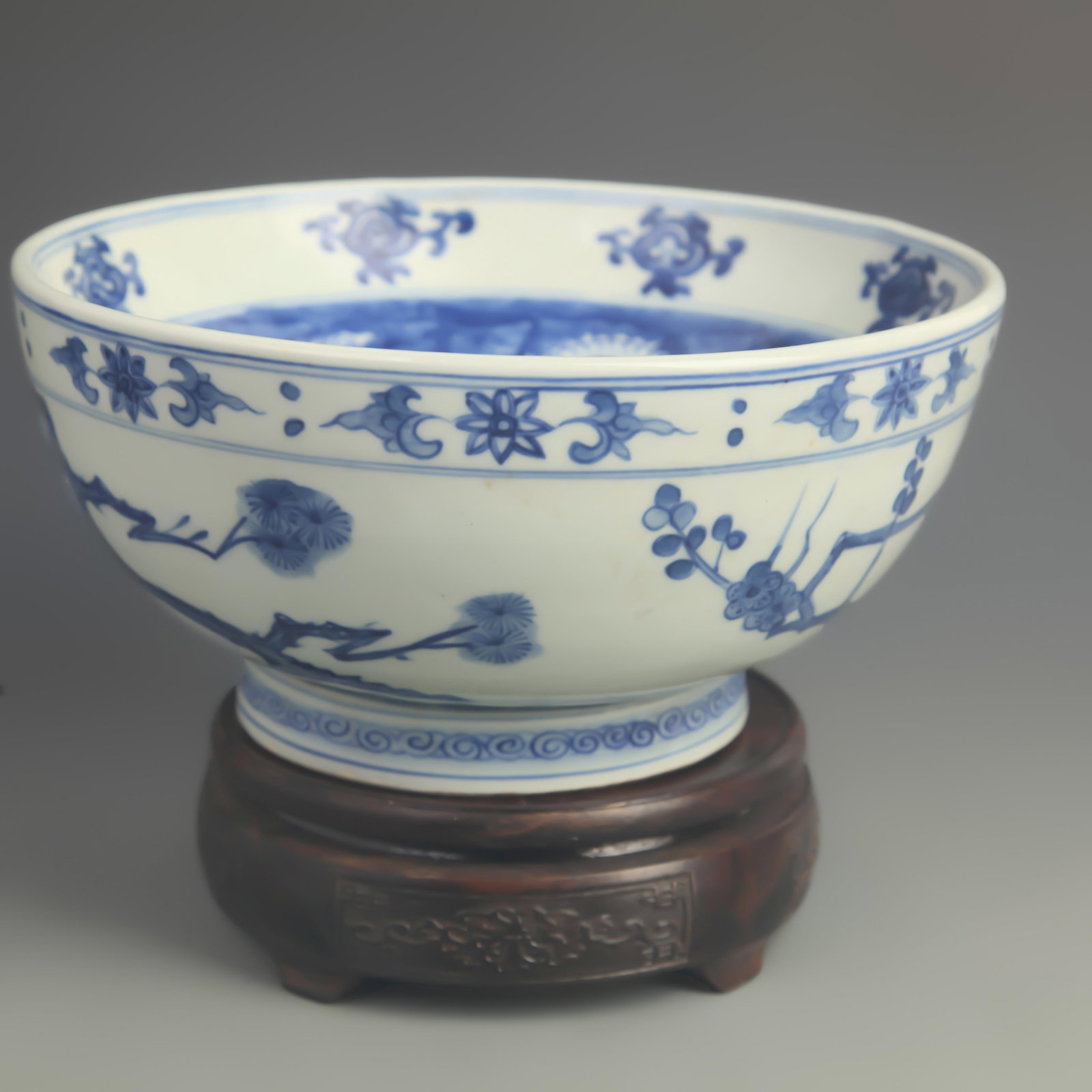 A BLUE-AND-WHITE ???RABIC-INSCRIBED LOTUS??PORCELAIN BOWL: Ming Dynasty Style Wan Li Period; High: 4.00 inch; Diameter: 9.80 inch; wooden base for picture and display purpose only.