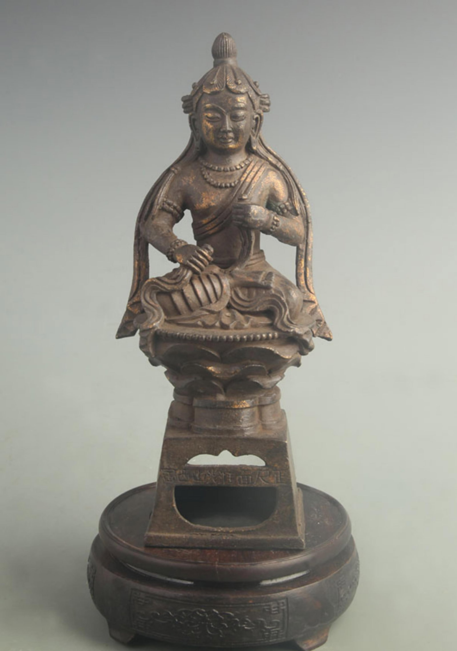 GILT BRONZE TIBETAN PROTECTOR DEITY STATUE: 19th Century; High: 9.80 inch; Width: 3.40 inch; Long: 3.40 inch; wooden base for picture and display purpose only.