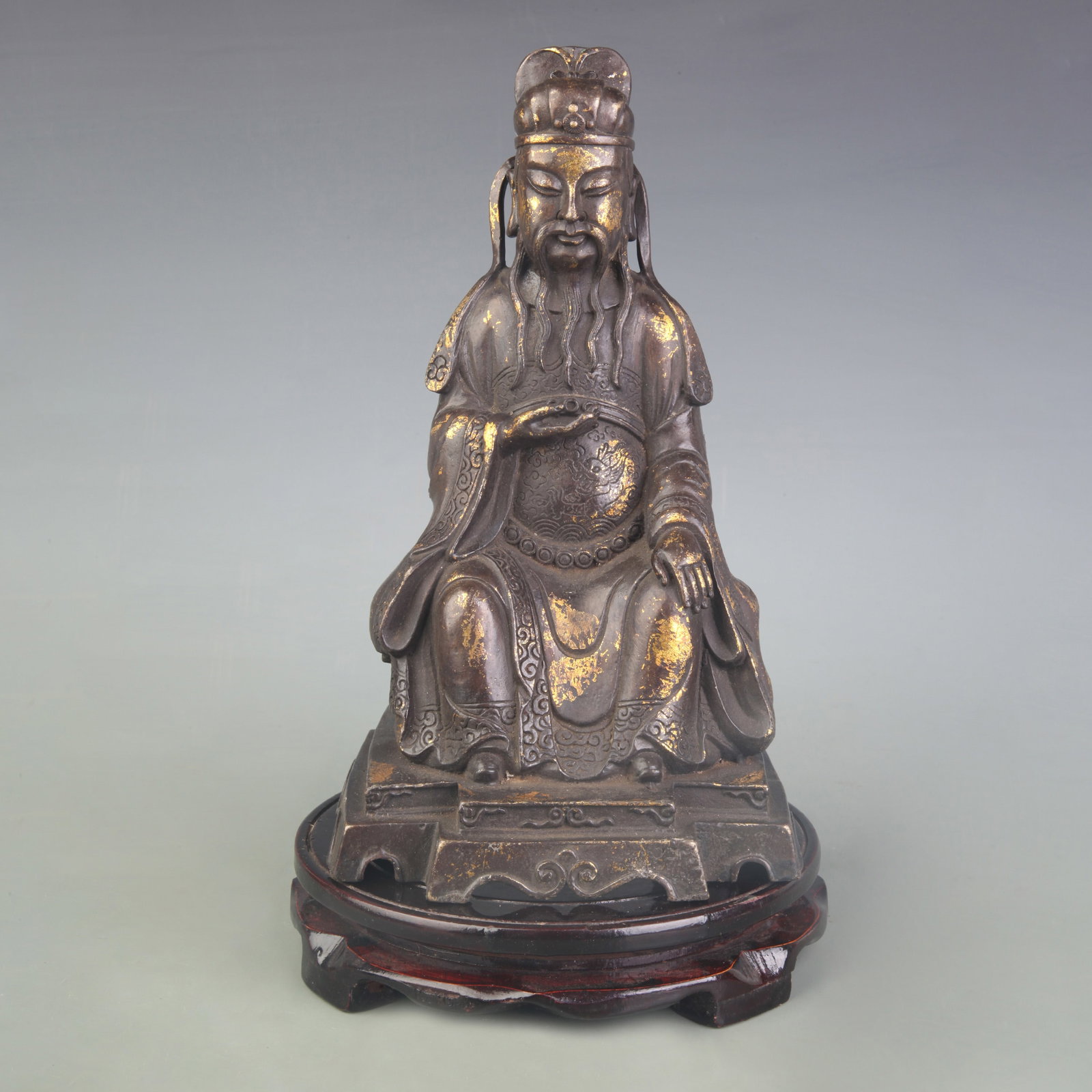 A FINE BRONZE GOD OF WEALTH DEITY STATUE: Qing Dynasty; High: 10.0 inch; wooden base for picture and display purpose only.