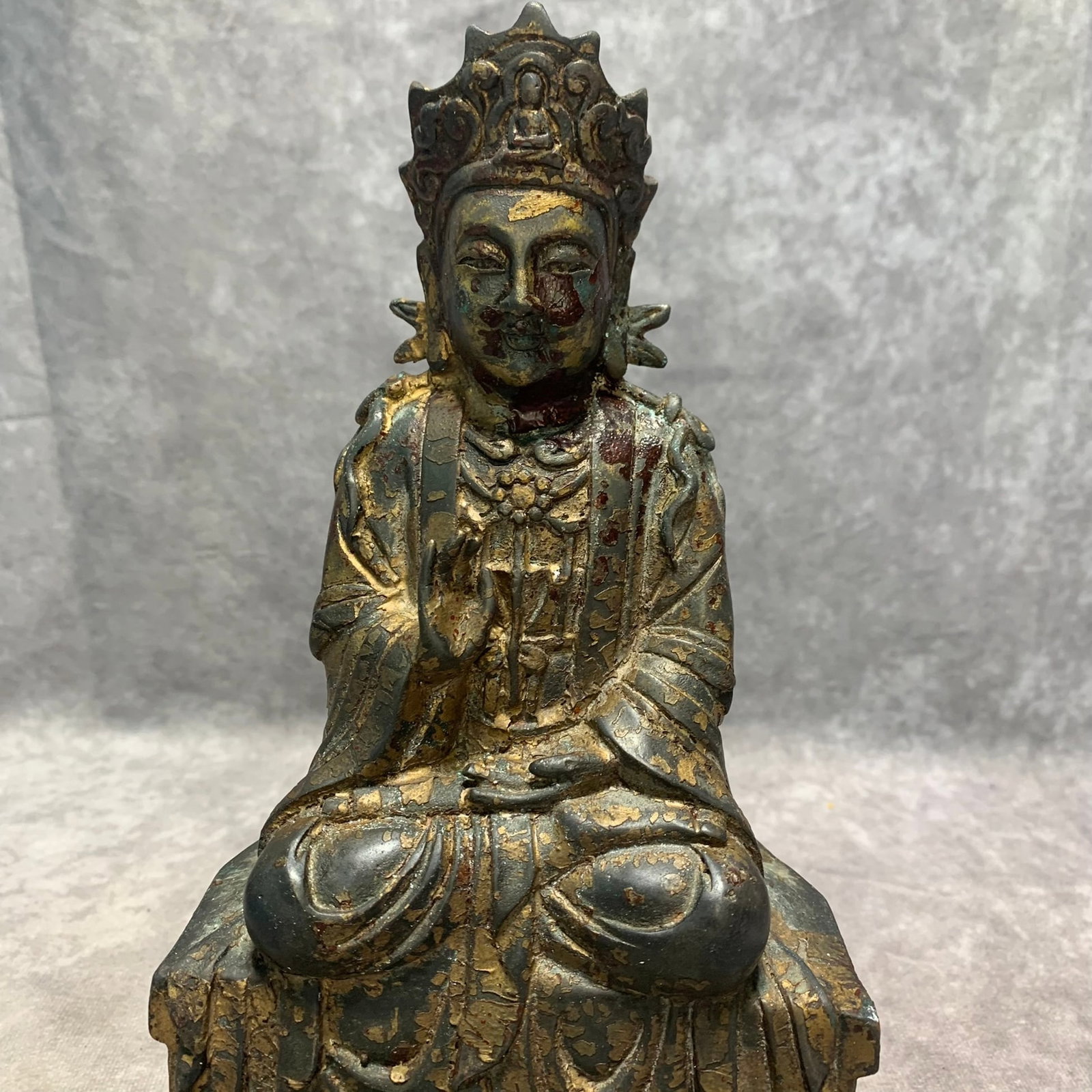 GILT BRONZE SEATED SHAKYAMUNI STATUE: Qing Dynasty; Long: 6.5 inch; Width: 3.8 inch; High: 9.9 inch; wooden base for picture and display purpose only.