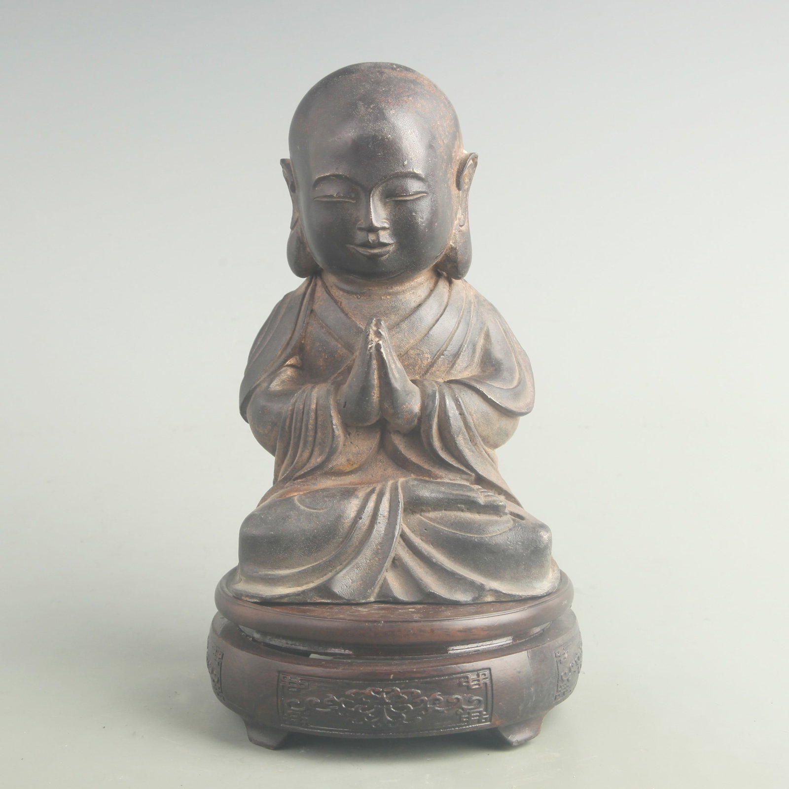 A FINE GILT-BRONZE CHILD BUDDHA: 19th Century; High:7.10 inch; Width: 4.20 inch; wooden base for picture and display purpose only.