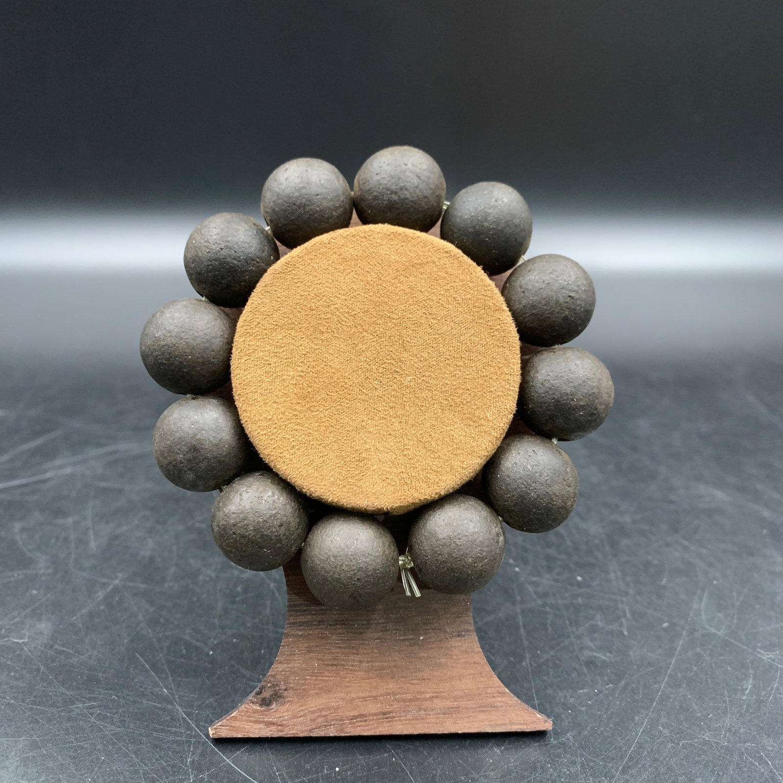 A FINE BLACK EBONY WOOD MADE BRACELET: Modern; Long: 3.1 inch; Diameter: 0.6 inch; Long: 4 inch; Diameter: 0.7 inch;