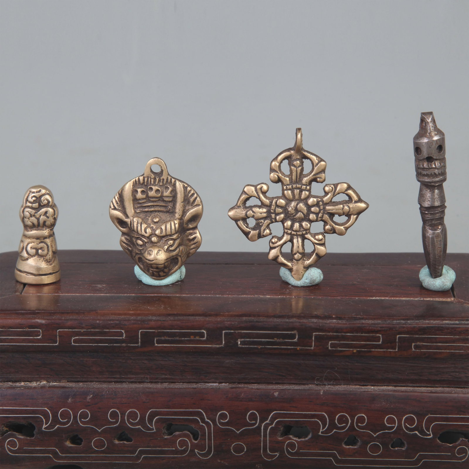 GROUP OF TIBETAN BUDDHIST STATUE AND RITUAL OBJECTS (4 PIECES): Qing Dynasty; Long:2.2 inch to 1.3 inch