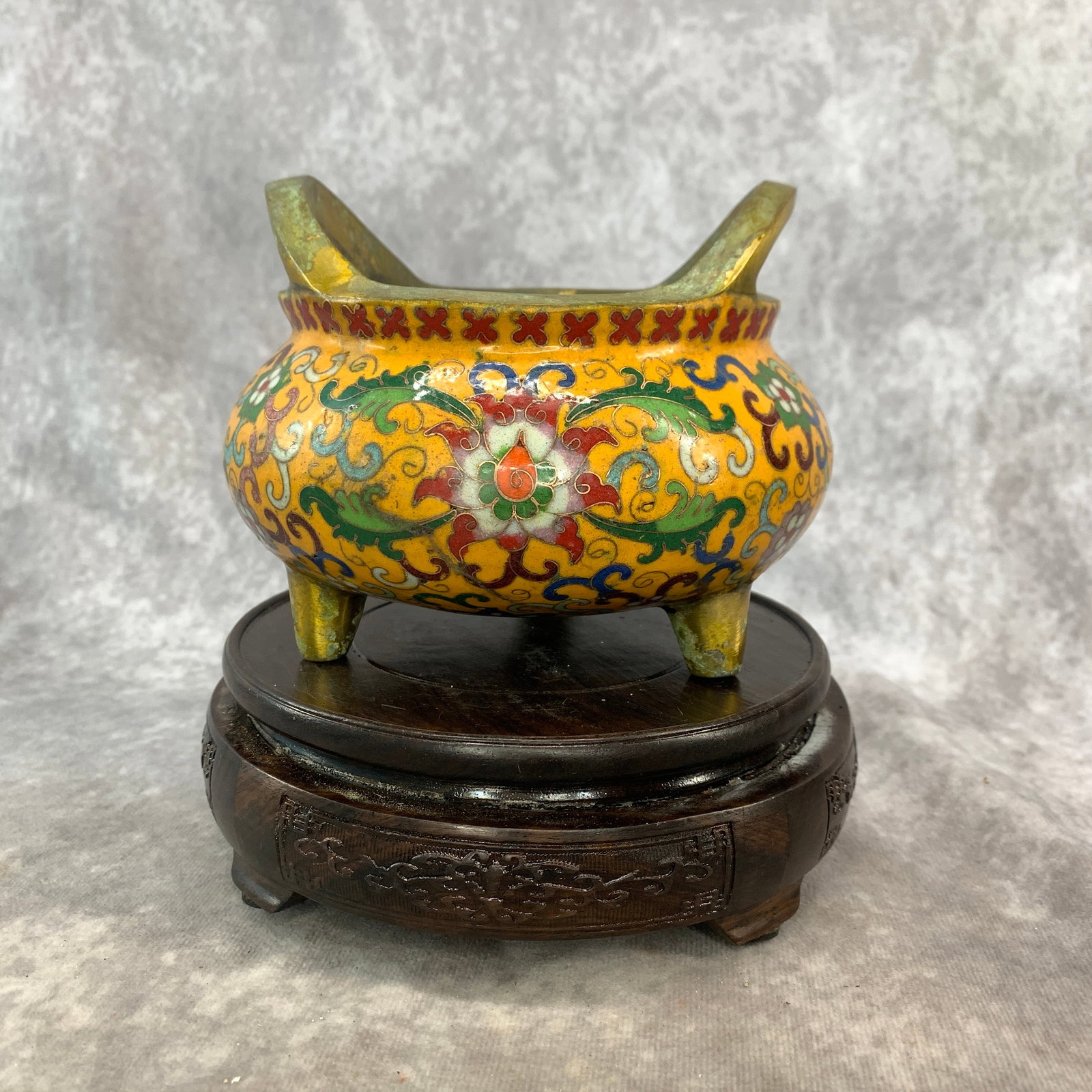 A FINE YELLOW COLOR CLOISONNE ENAMEL TRIPOD CENSER: Qing Dynasty; High: 4.5 inch; Diameter: 5.8 inch; wooden base for picture and display purpose only.