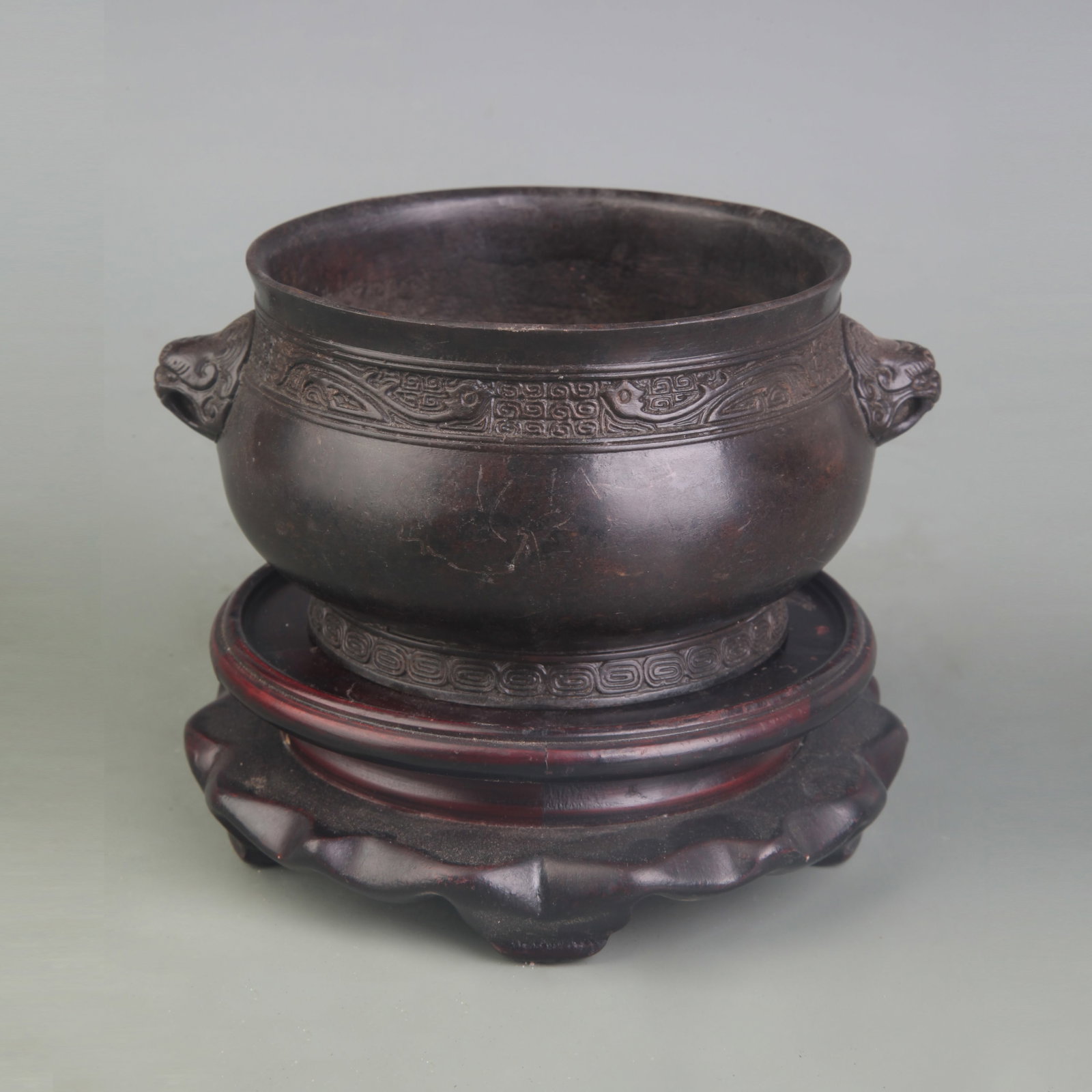 BEAST-HANDLE ROUND-FOOT CENSER INSCRIBED WU YANJING: Qing Dynasty; Diameter: 4.1 inch; High:2.7 inch; wooden base for picture and display purpose only.