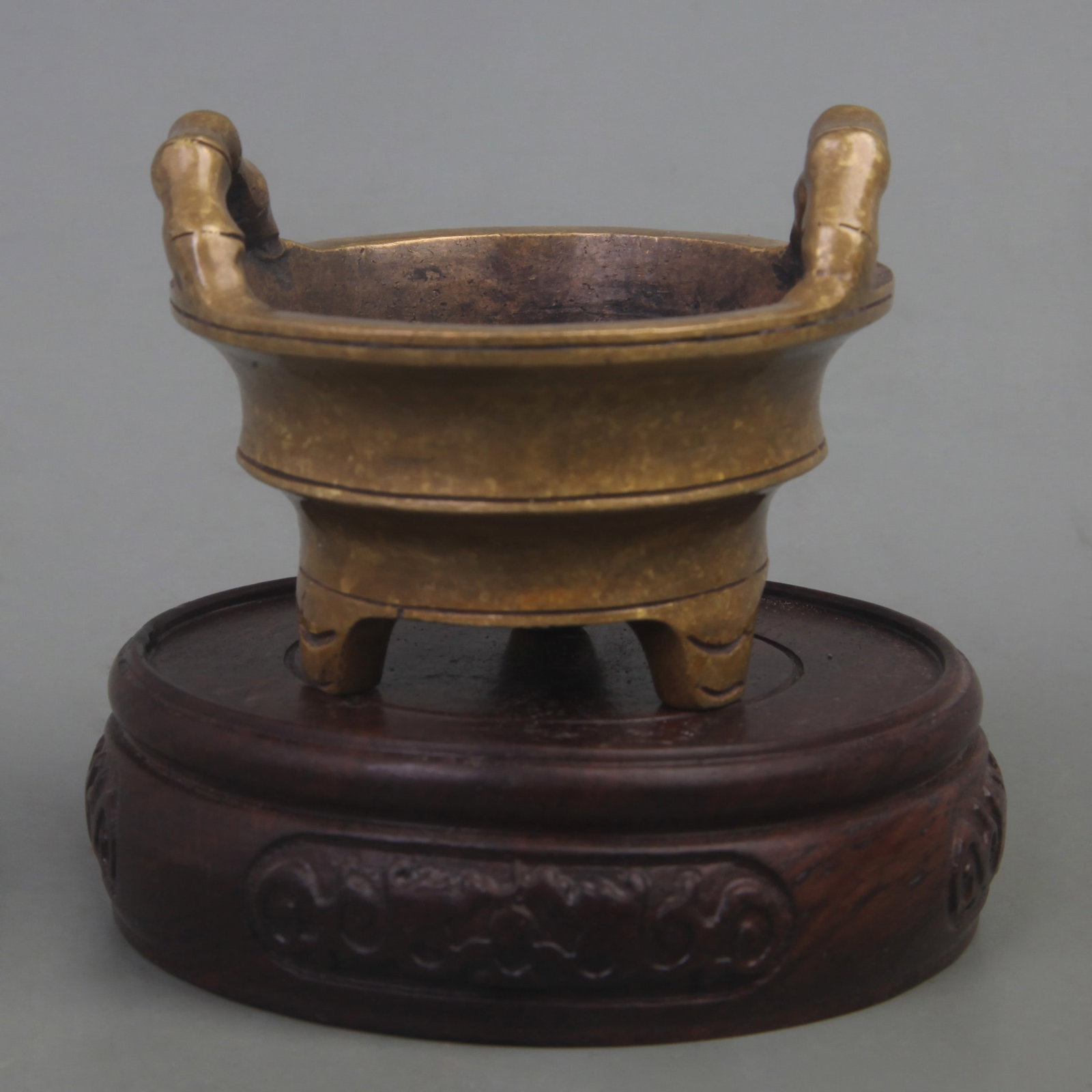 A FINE XUAN DE STYLE BAMBOO STYLE THREE FOOT CENSER: Ming Dynasty Style, Diameter: 2.8 inch; High: 2.1 inch; wooden base for picture and display purpose only.