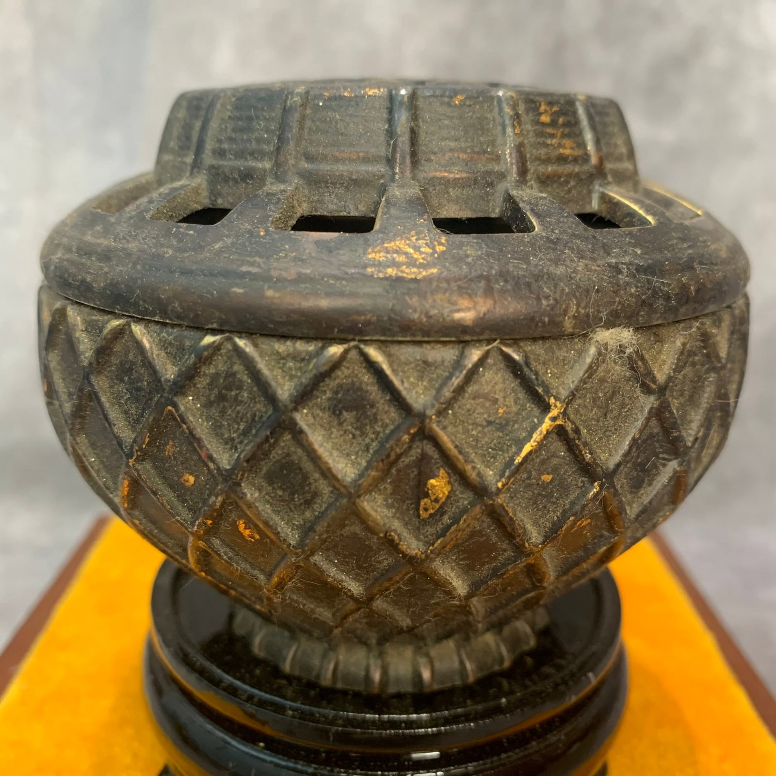 A FINELY CARVED BRONZE INCENSE BURNER: 19th Century; High: 3.2 inch; Diameter: 3.9 inch; wooden base for picture and display purpose only.