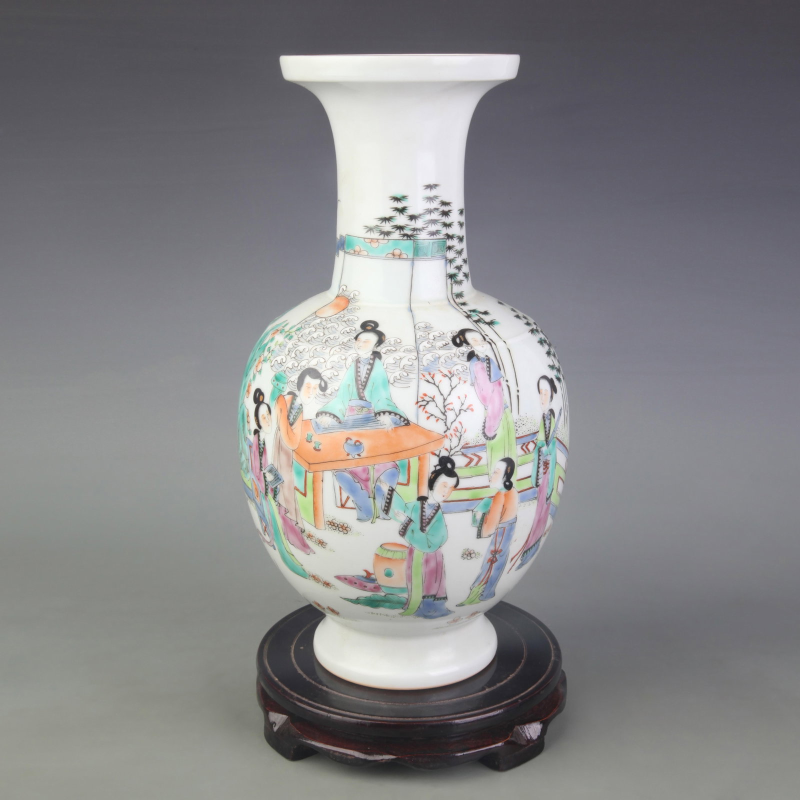 A LIGHT ROUGE ENAMEL GLAZED FIGURAL PORCELAIN VASE: Qing Dynasty; Diameter: 4.8 inch; High: 12.9 inch; wooden base for picture and display purpose only.