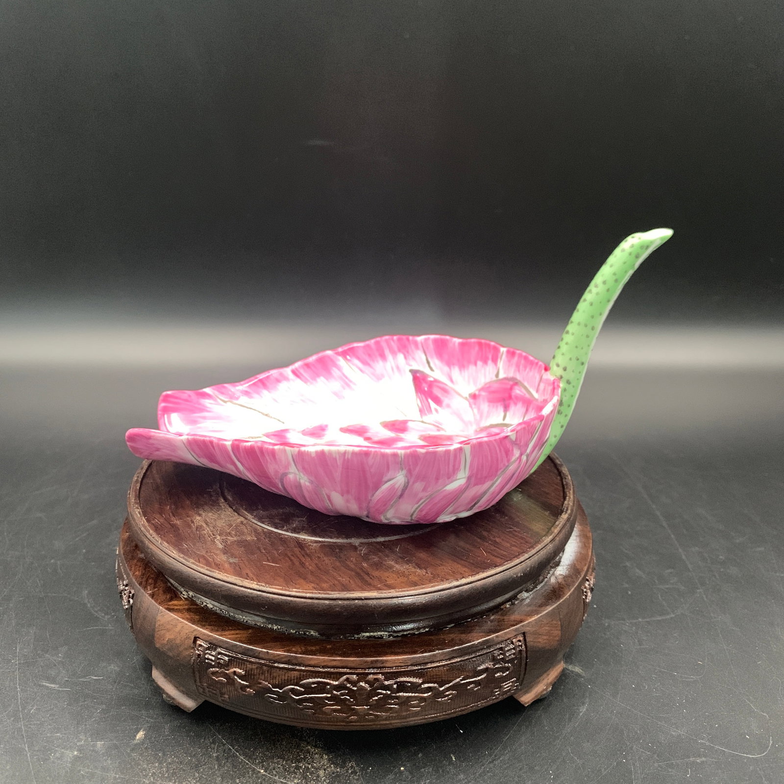 FAMILLE ROSE PINK LOTUS PETAL SEED-POD HANDLE LIBATION CUP: Qing Dynasty; Long: 7 inch; Width: 4.3 inch; High: 3.4 inch; wooden base for picture and display purpose only.