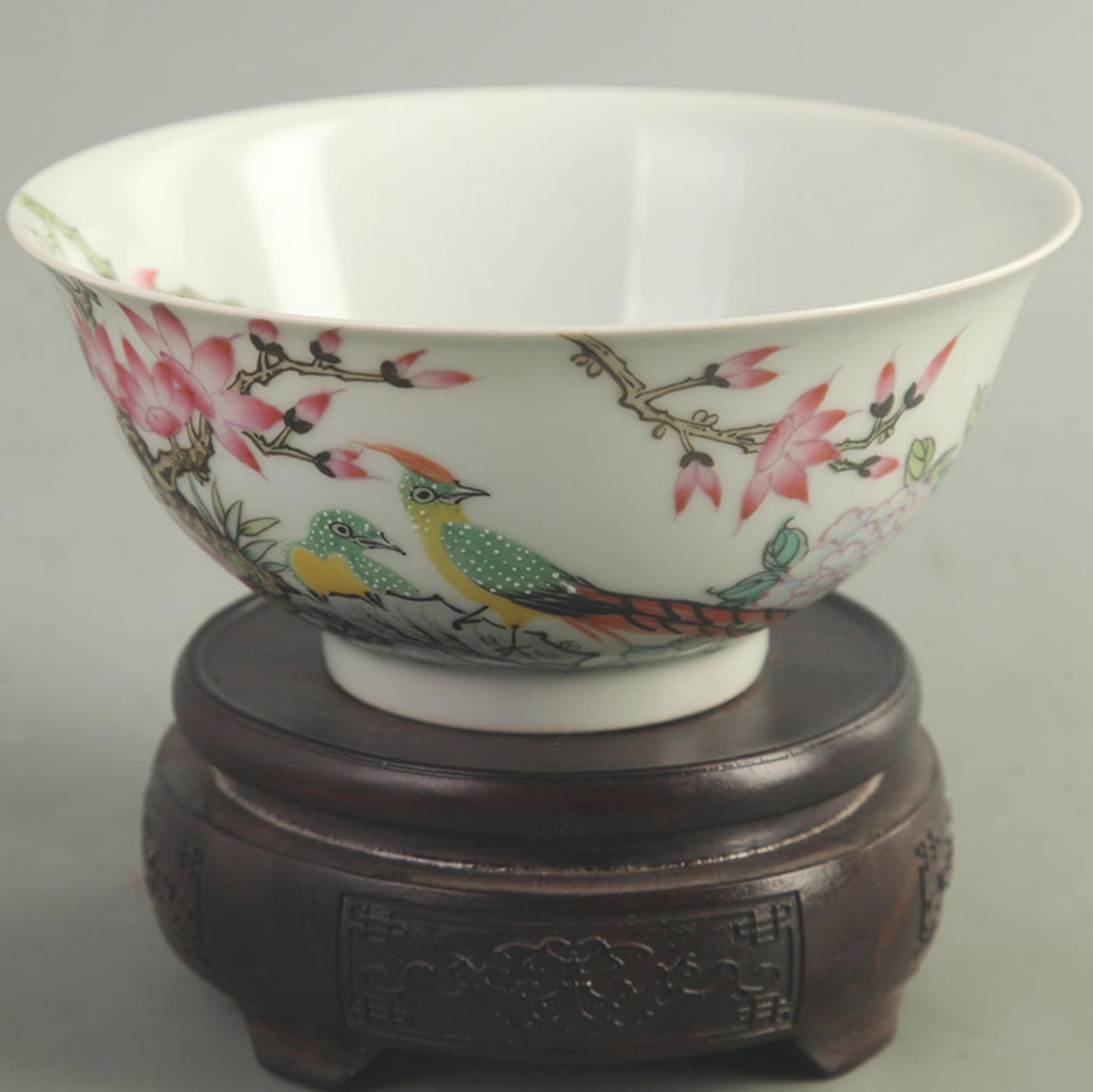 FAMILLE ROSE ENAMEL BIRD AND FLOWER BOWL: Qing Dynasty Yong Zheng Period; High: 2.60 inch; Diameter: 5.90 inch; wooden base for picture and display purpose only.