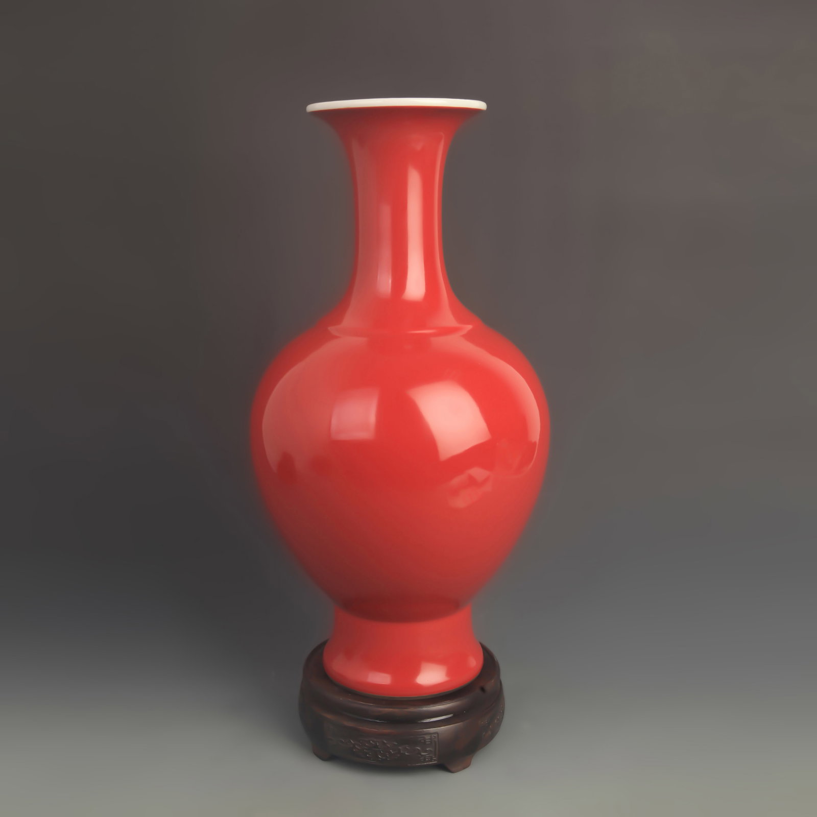 A SACRIFICIAL RED-GLAZED DISPLAY VASE: Qing Dynasty Qian Long Period; High: 14.5 inch; Diameter: 7.00 inch; wooden base for picture and display purpose only.