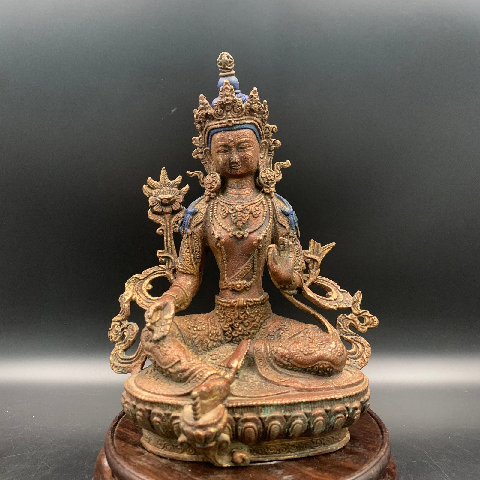 RARE TIBETAN GILT BRONZE FIGURE OF GREEN TARA: Qing Dynasty; Long: 6 inch; Width:3.3 inch; High: 8.3 inch; wooden base for picture and display purpose only.