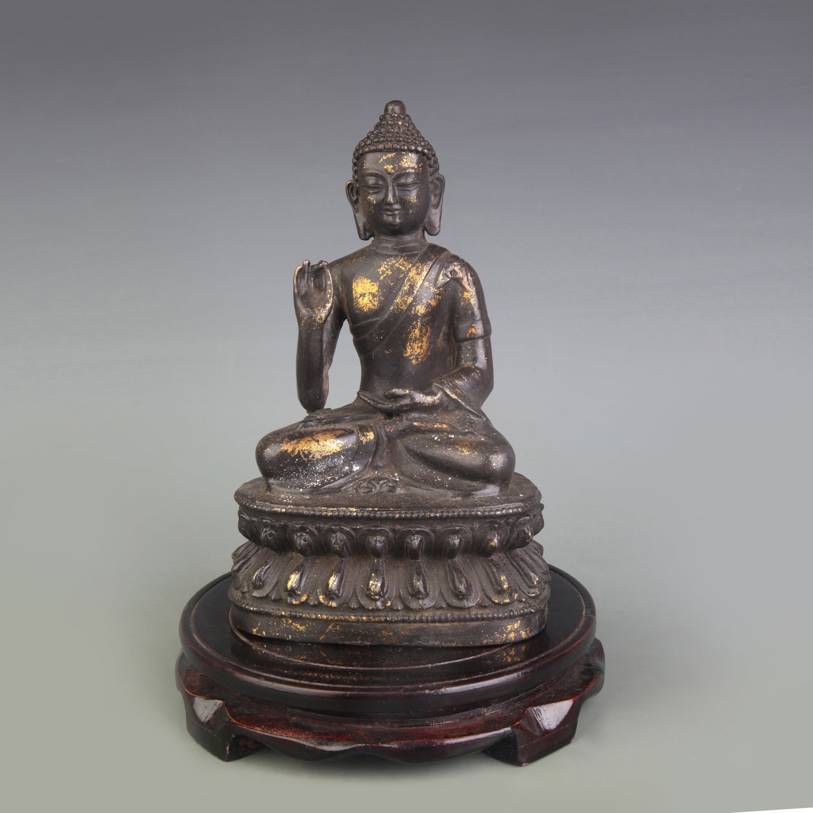 A FIGURE OF BRONZE SHAKYAMUNI BUDDHA: 19th Century; High: 8.0 inch; wooden base for picture and display purpose only.