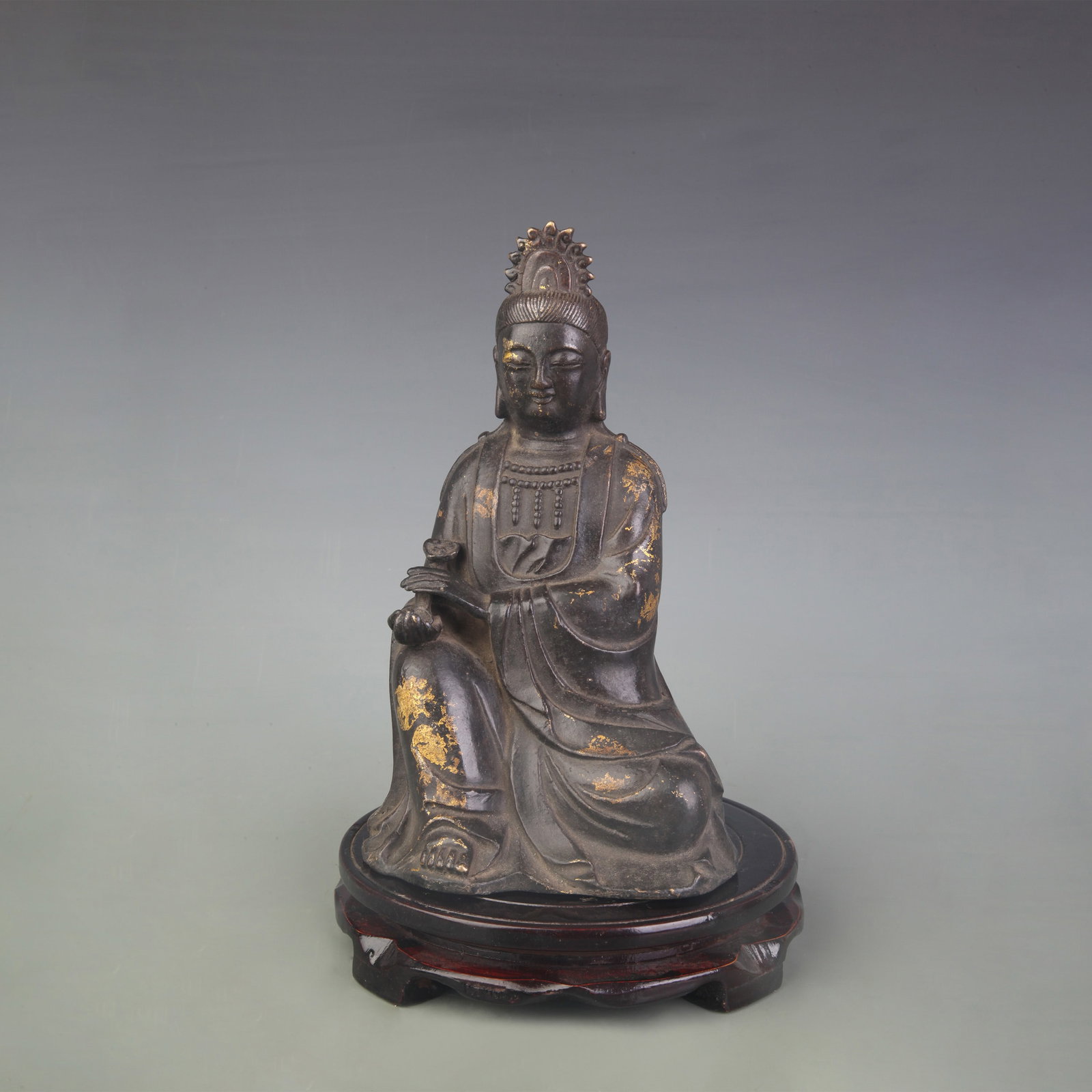 A FINE BRONZE SEATED GUANYIN STATUE: Qing Dynasty; High: 9.0 inch; wooden base for picture and display purpose only.