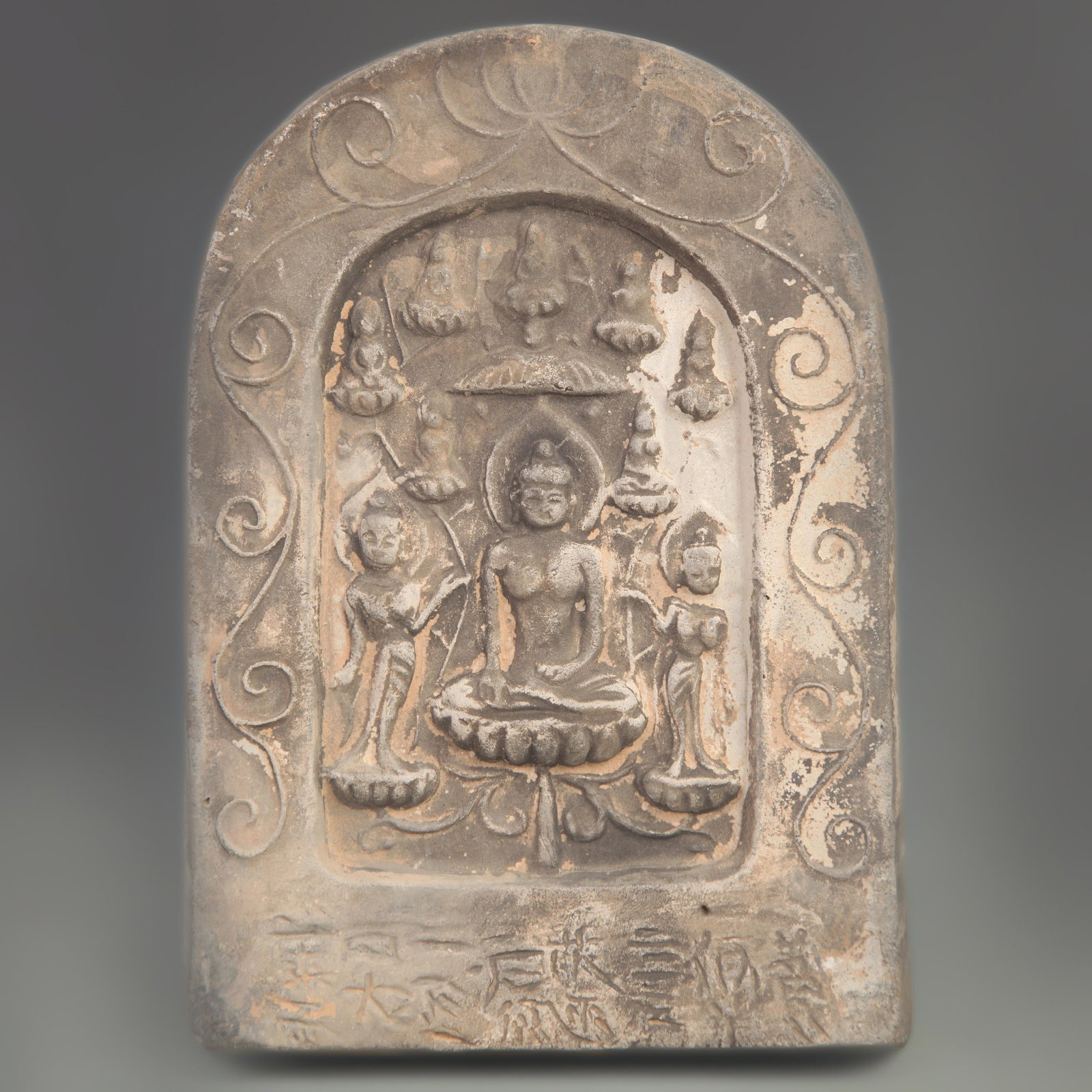 A FINE CERAMIC TILE CARVING OF GAUTAMA BUDDHA: Tang Dynasty Style, High: 8.00 inch; Width: 5.50 inch; wooden base for picture and display purpose only.