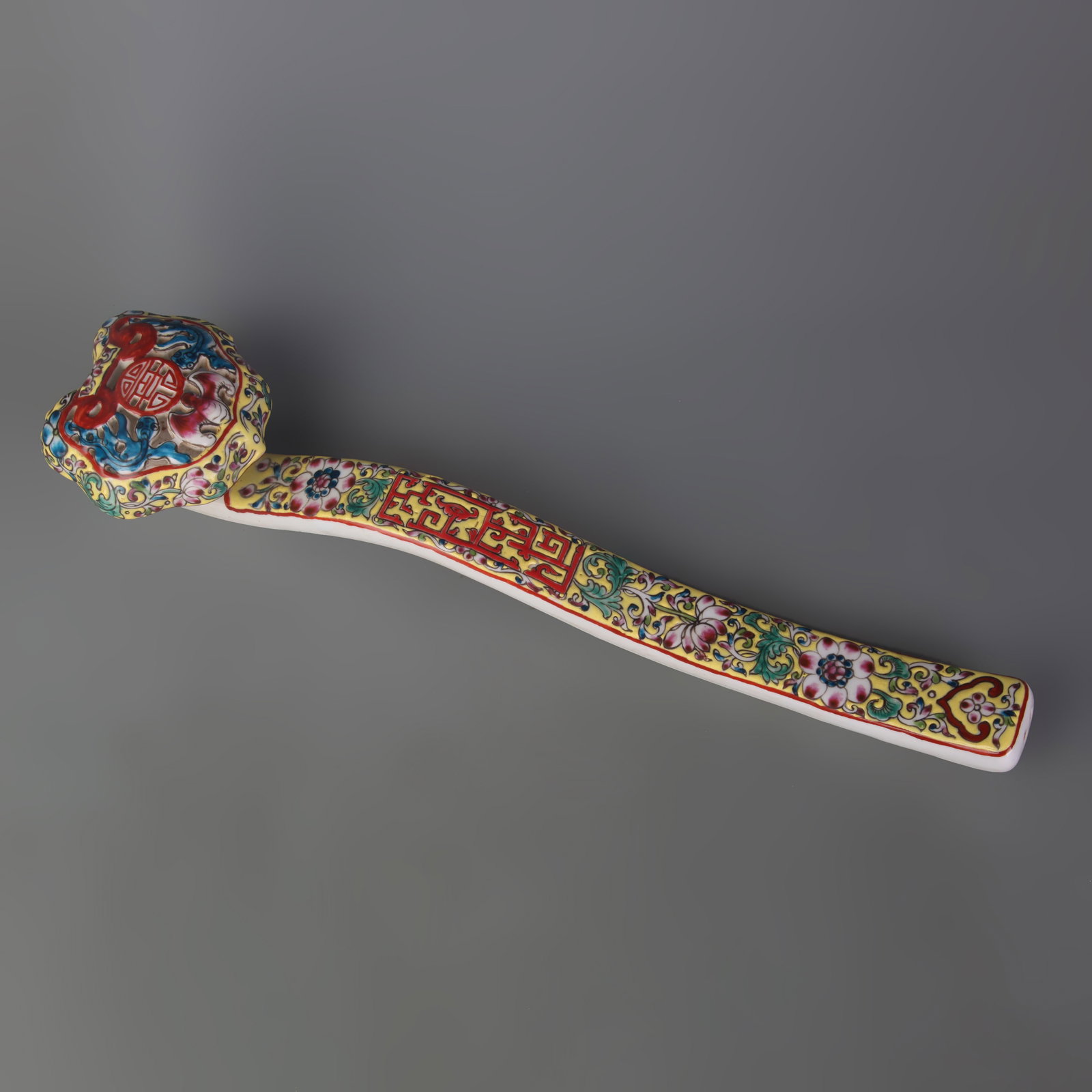 FAMILLE ROSE RUYI SCEPTER WITH ???U??AND LONGEVITY PATTERN: Qing Dynasty Qian Long Period; Long: 16.9 inch; wooden base for picture and display purpose only.