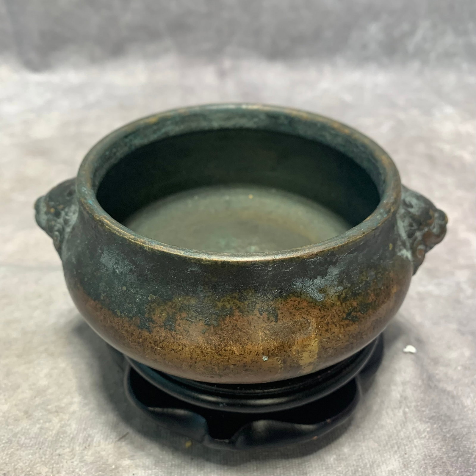 XUAN DE MARK BRONZE INCENSE BURNER WITH LION EARS: Ming Dynasty; High: 2.1 inch; Diameter: 5.5 inch; wooden base for picture and display purpose only.
