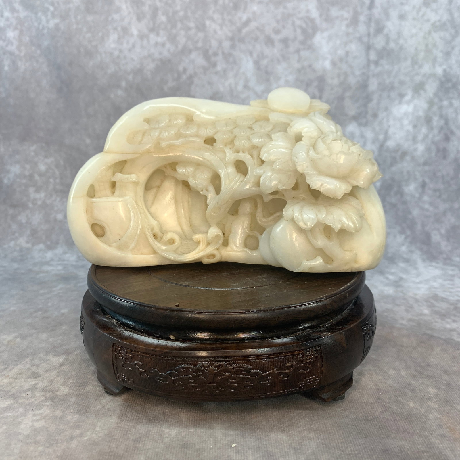 REAR LARGE JADE CARVING FLORAL MOUNTAIN LANDSCAPE BOULDER: Qing Dynasty; Long: 7.1 inch; Width:2.3 inch; High: 3.8 inch; wooden base for picture and display purpose only.