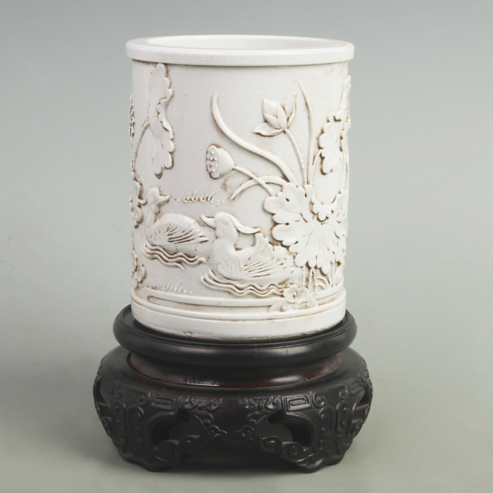 WANG BING RONG MARK "LOTUS AND MANDARIN DUCKS" PORCELAIN BRUSH POT: Qing Dynasty; High:5.5 inch; Diameter: 4.3 inch; wooden base for picture and display purpose only.
