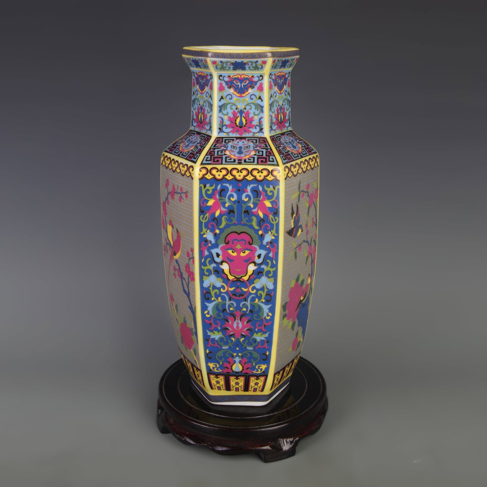 A FAMILLE ROSE HEXAGONAL VASE WITH CLOISONN??STYLE DECORATION: Qing Dynasty Yong Zheng Period; Width: 5.8 inch; High: 13.2 inch; wooden base for picture and display purpose only.