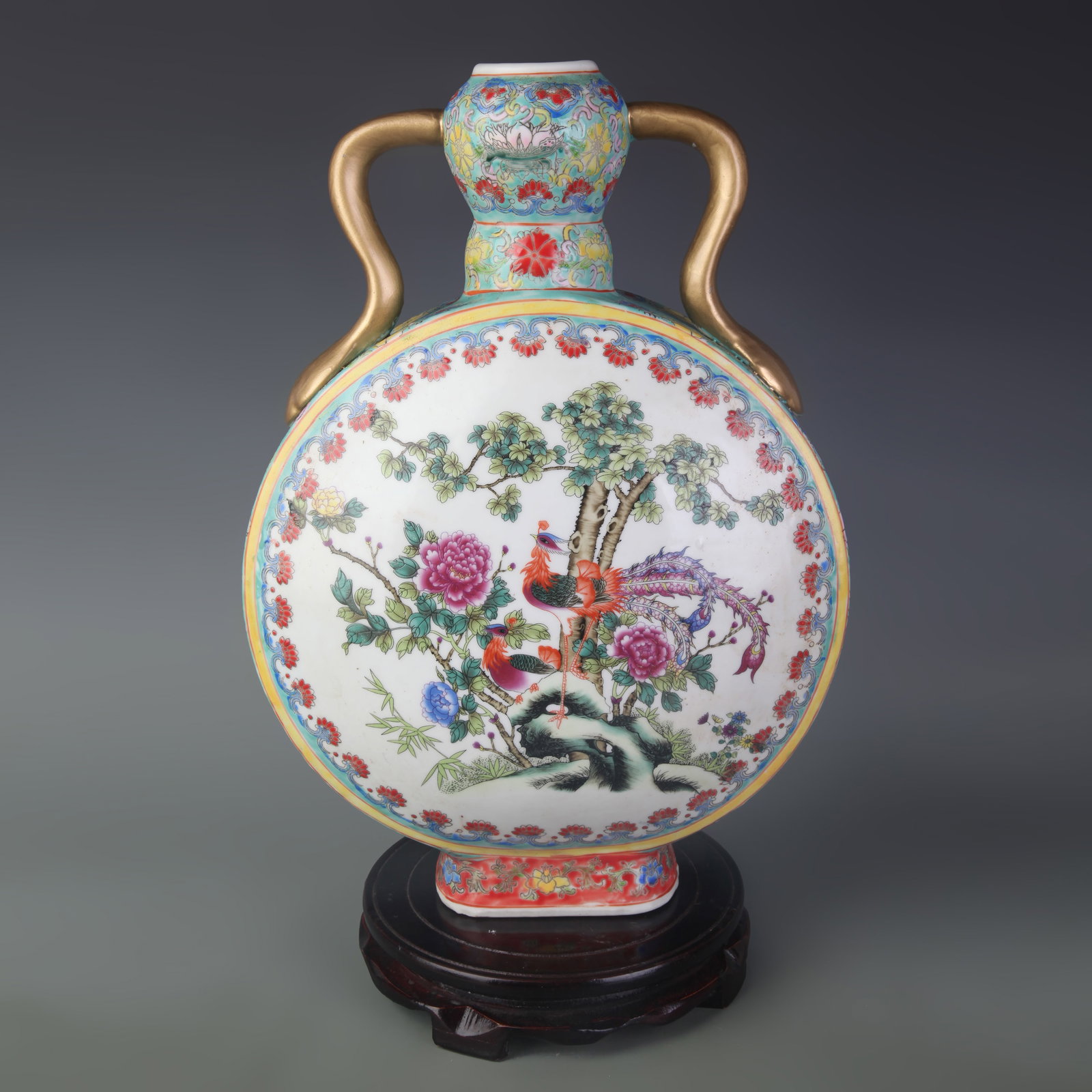 A FINE FAMILLE ROSE RUYI EAR FLAT PORCELAIN VASE: Qing Dynasty Qian Long Period; Width: 10.0 inch; High: 14.0 inch; wooden base for picture and display purpose only.