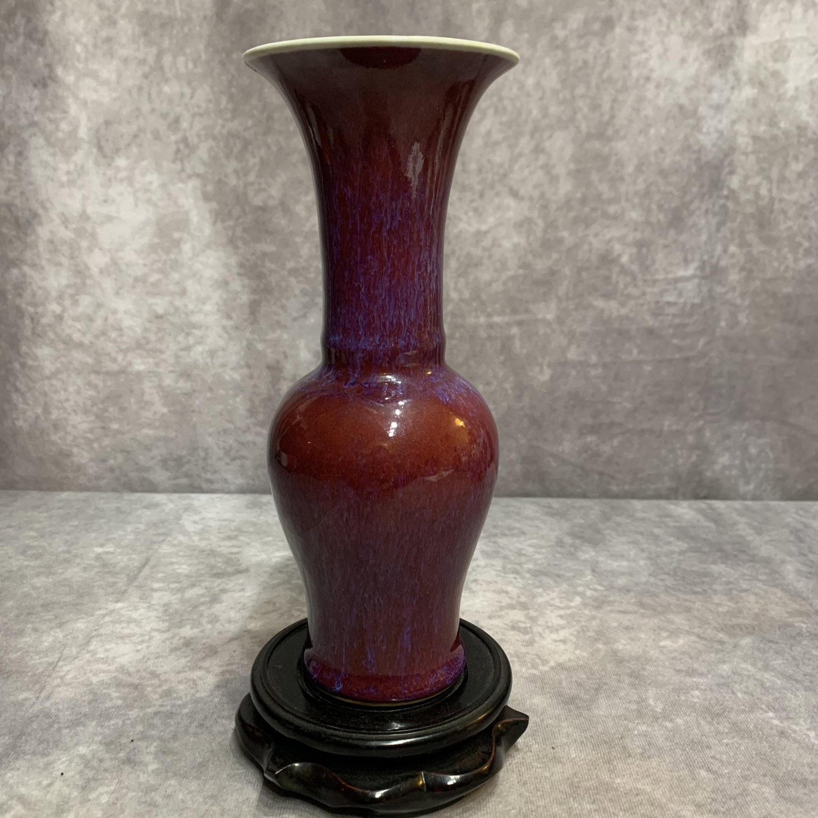 A FINE RED COLOR GLAZED PORCELAIN FLOWER VASE: Qing Dynasty; High: 9.0 inch; Diameter: 3.5 inch ; wooden base for picture and display purpose only.