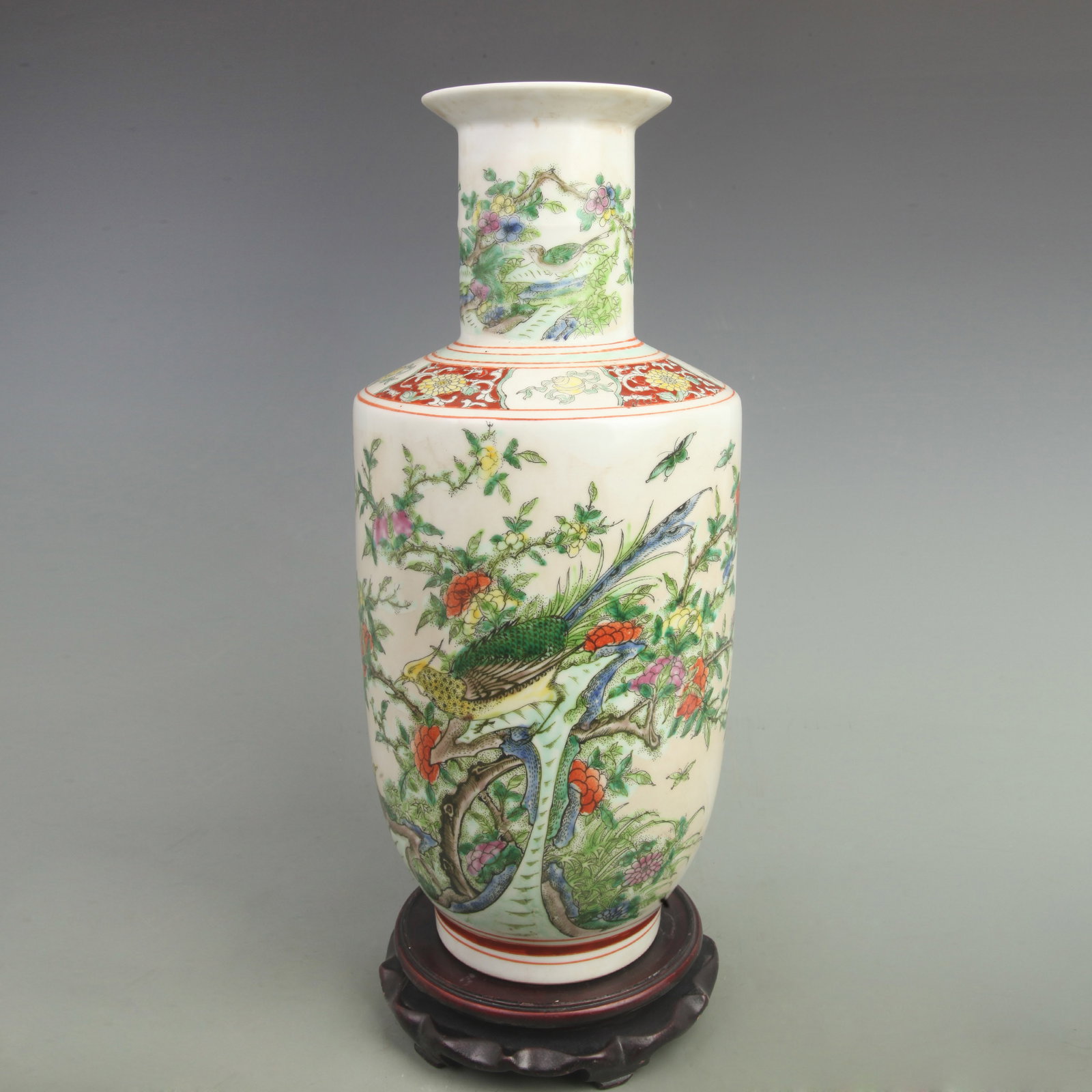 FAMILLE ROSE FLOWER AND BIRD PATTERN PORCELAIN VASE: Qing Dynasty Kang Xi Period, High: 16.81 inch; Width: 7.5 inch; wooden base for picture and display purpose only.