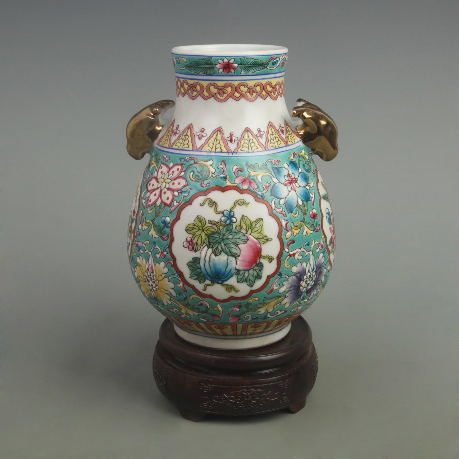 RARE FAMILLE ROSE BLUE GROUND DEER HEAD PORCELAIN VASE: Qing Dynasty Qian Long Period; High: 8 inch; Width: 6 inch; wooden base for picture and display purpose only.