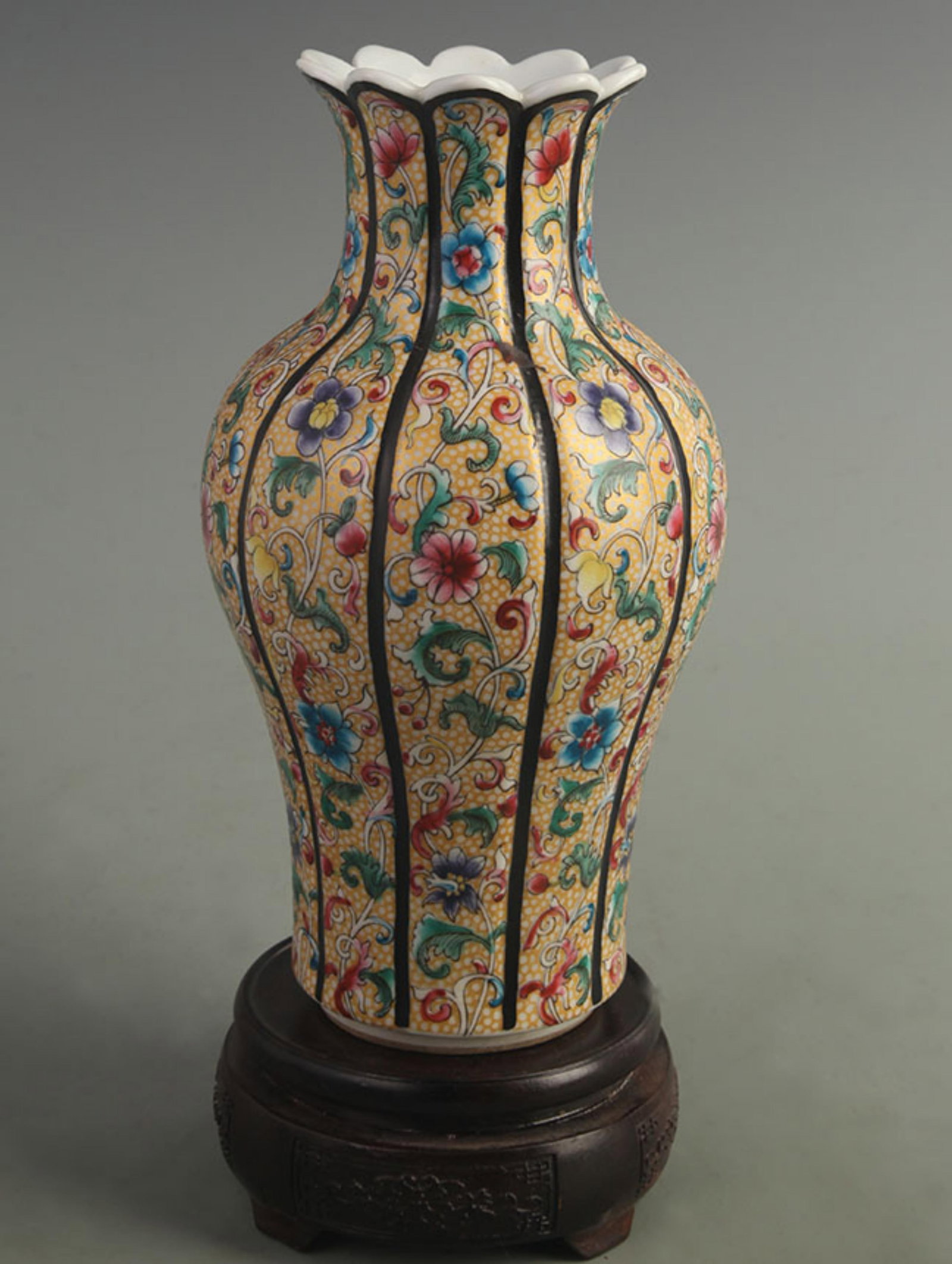 FAMILLE ROSE GOURD-SHAPED VASE WITH HUNDRED-FLOWER PATTERN AND GILDING: Qing Dynasty Qian Long Period; High: 9.20 inch; Width: 5.00 inch; wooden base for picture and display purpose only.