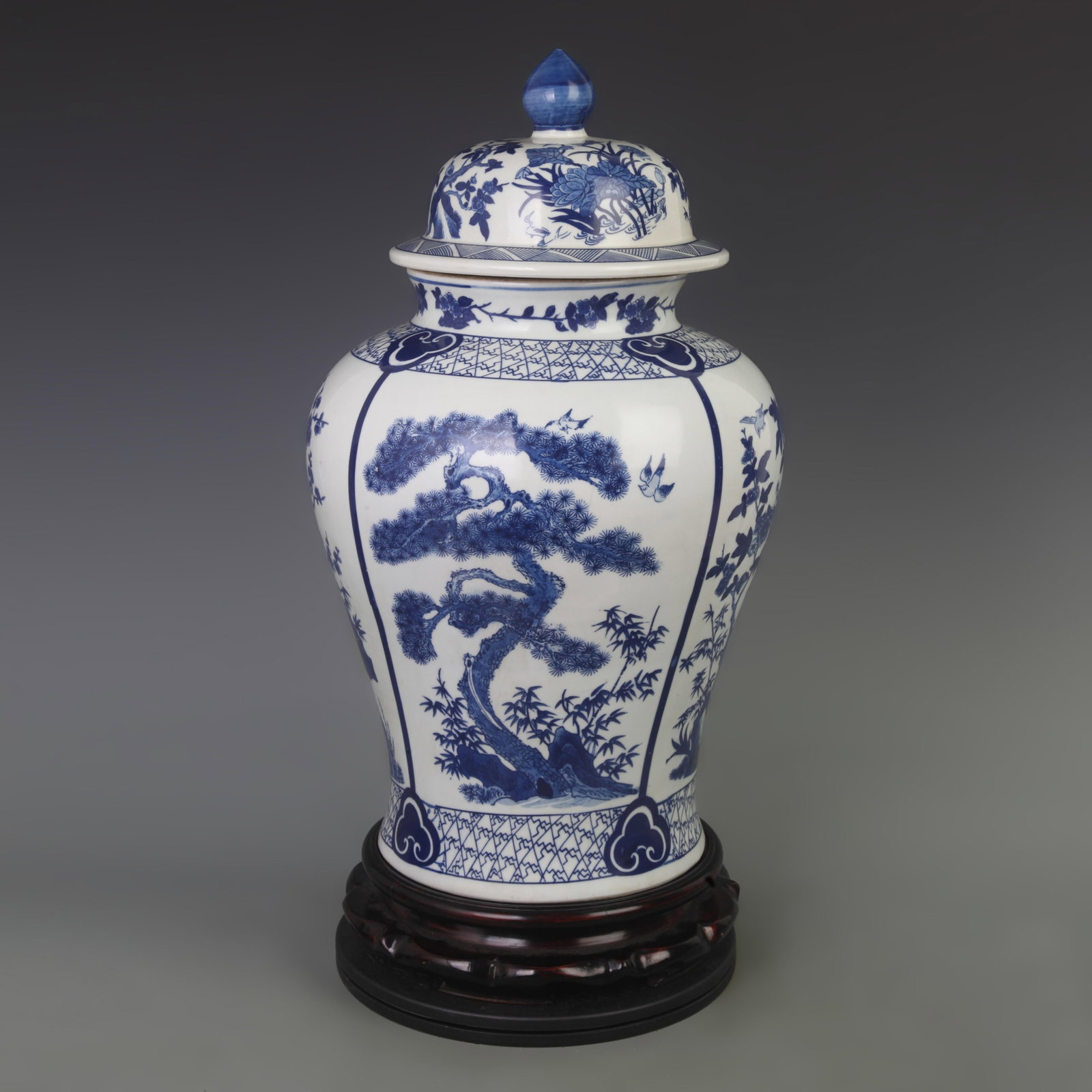 BLUE AND WHITE FLOWER AND BIRD PATTERN GENERAL STYLE PORCELAIN JAR: Qing Dynasty Qian Long Period; High: 20 inch; Diameter: 6.8 inch; wooden base for picture and display purpose only.