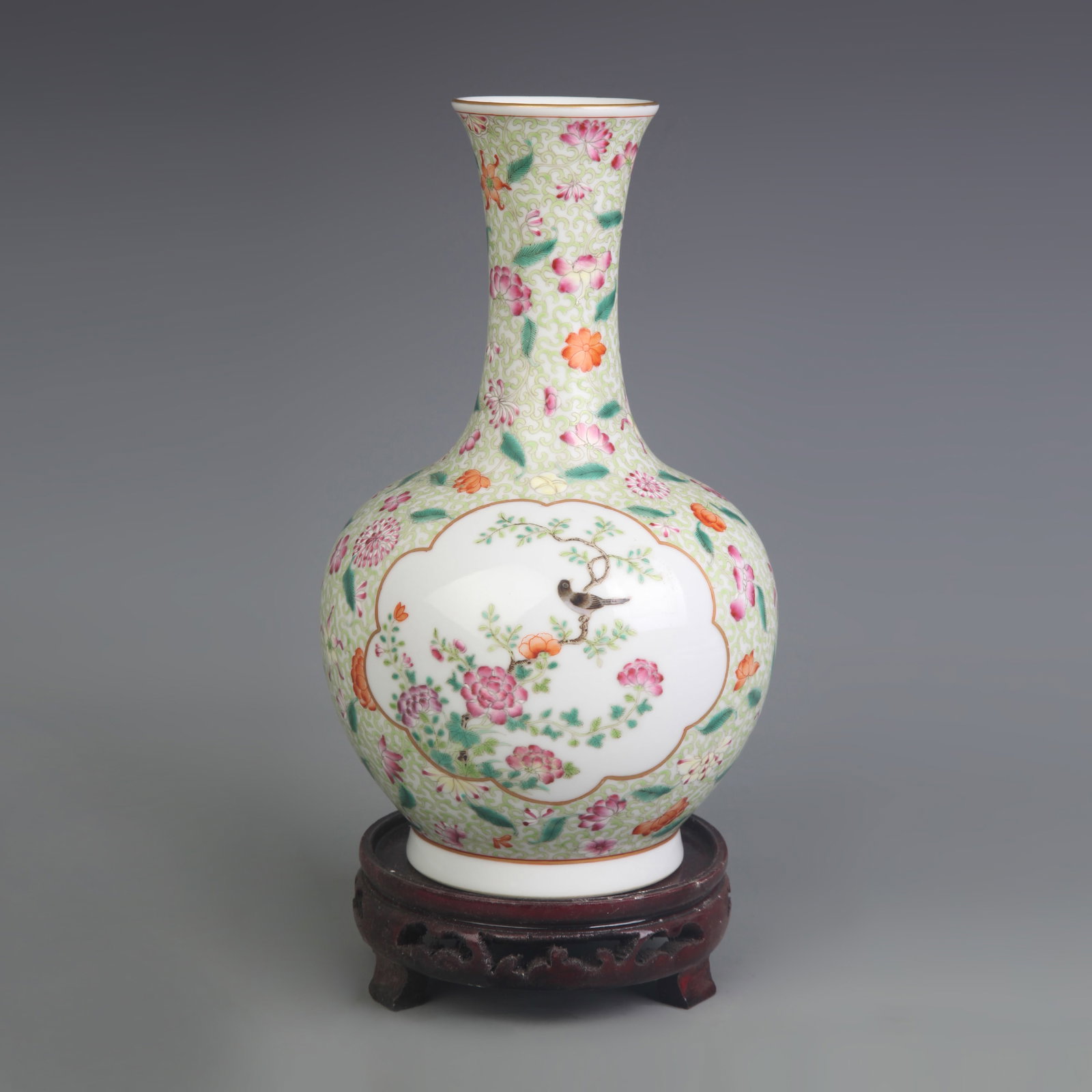 FAMILLE ROSE GLAZED FLOWER AND BIRD PATTERN GLOBE PORCELAIN VASE: Qing Dynasty Qian Long Period, Diameter: 3.3 inch; Width: 5.0 inch; High: 9.0 inch; wooden base for picture and display purpose only.