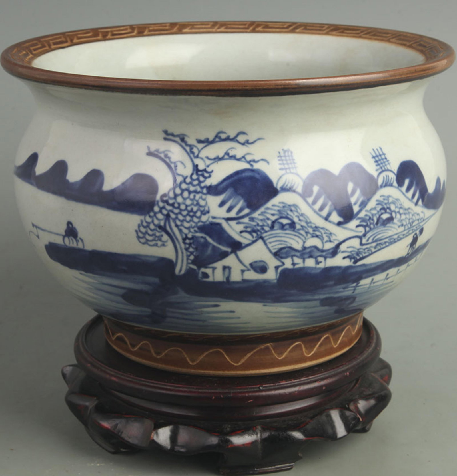 BLUE AND WHITE MOUNTAIN AND RIVER LANDSCAPE INCENSE BURNER: Qing Dynasty, High: 6.50 inch; Diameter: 8.60 inch; wooden base for picture and display purpose only.