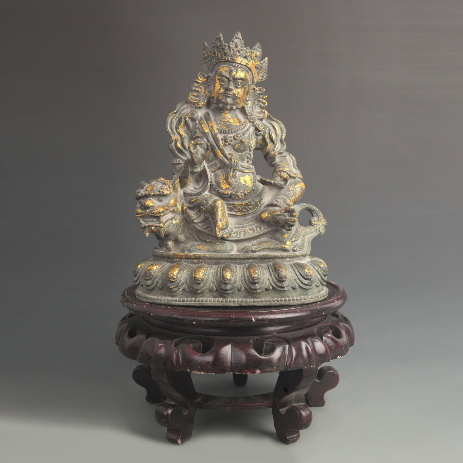 TIBETAN BUDDHIST GILT BRONZE WEALTH KING STATUE: 19th Century; High: 10.0 inch; Width: 7.25 inch; wooden base for picture and display purpose only.