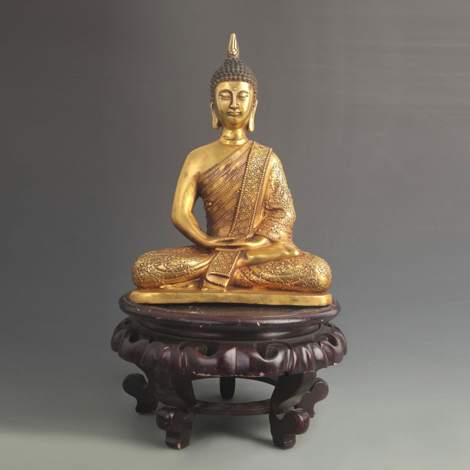 TIBETAN BUDDHIST GILT BRONZE AMITABHA BUDDHA STATUE: 20th Century; High: 11.0 inch; Width: 7.75 inch; wooden base for picture and display purpose only.