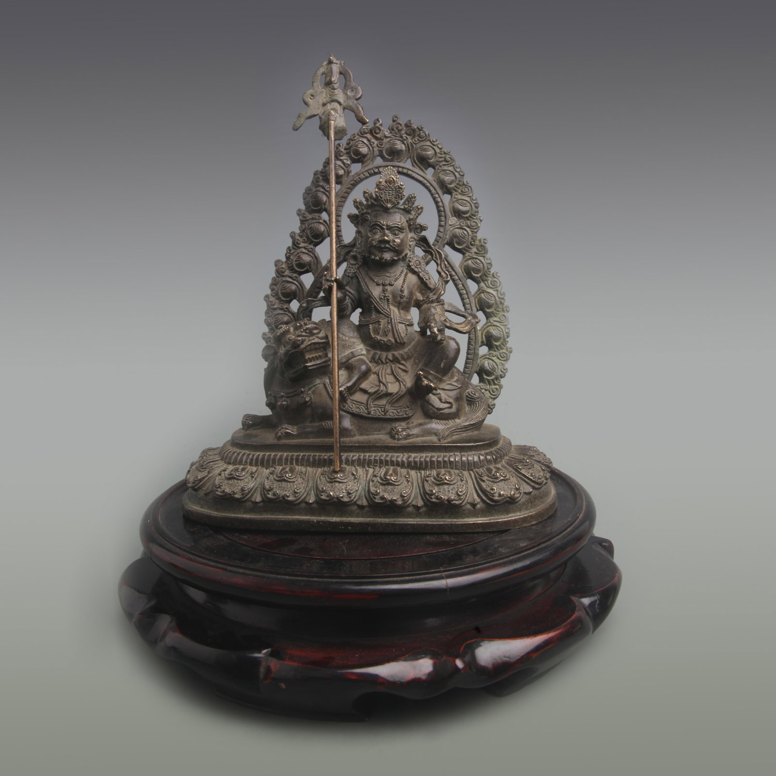 A FINELY MADE TREASURE KING BRONZE STATUE: Qing Dynasty; Width: 7.5 inch; High: 8.5 inch; wooden base for picture and display purpose only.