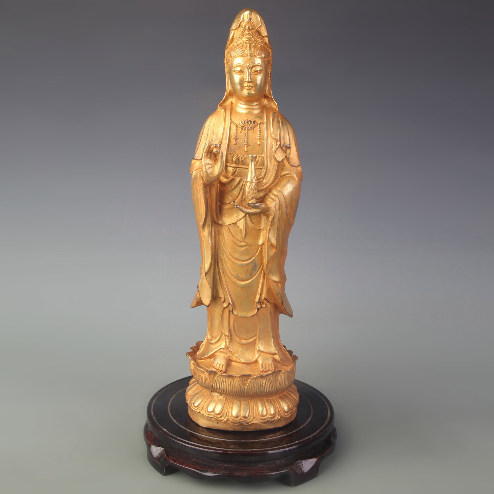 A FINE GILT BRONZE GUANYIN STATUE: Qing Dynasty; High:13.7 inch; wooden base for picture and display purpose only.
