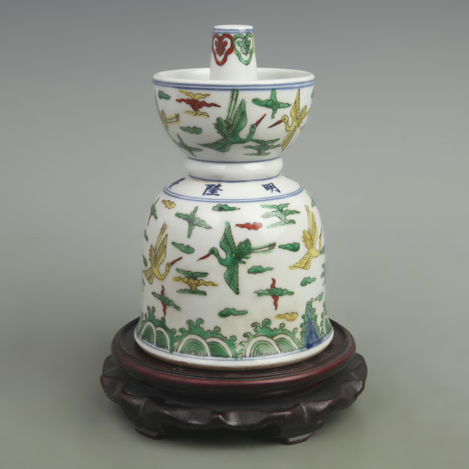 A FINE FAMILLE VERTE CRANE PATTERN PORCELAIN CANDLESTICK: Ming Dynasty Long Qing Period: High: 8.8 inch; Diameter: 5.5 inch; wooden base for picture and display purpose only.