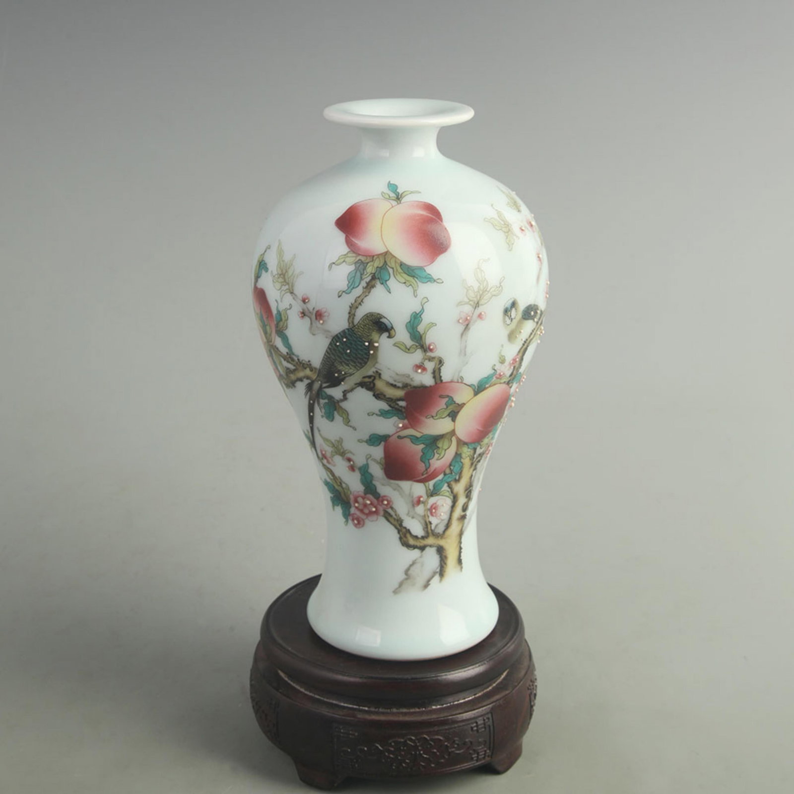 CLOISONN??COLOR PEACH BLOSSOM MEIPING PORCELAIN VASE: Qing Dynasty Qian Long Period; High: 8.50 inch; Width: 4.50 inch; wooden base for picture and display purpose only.