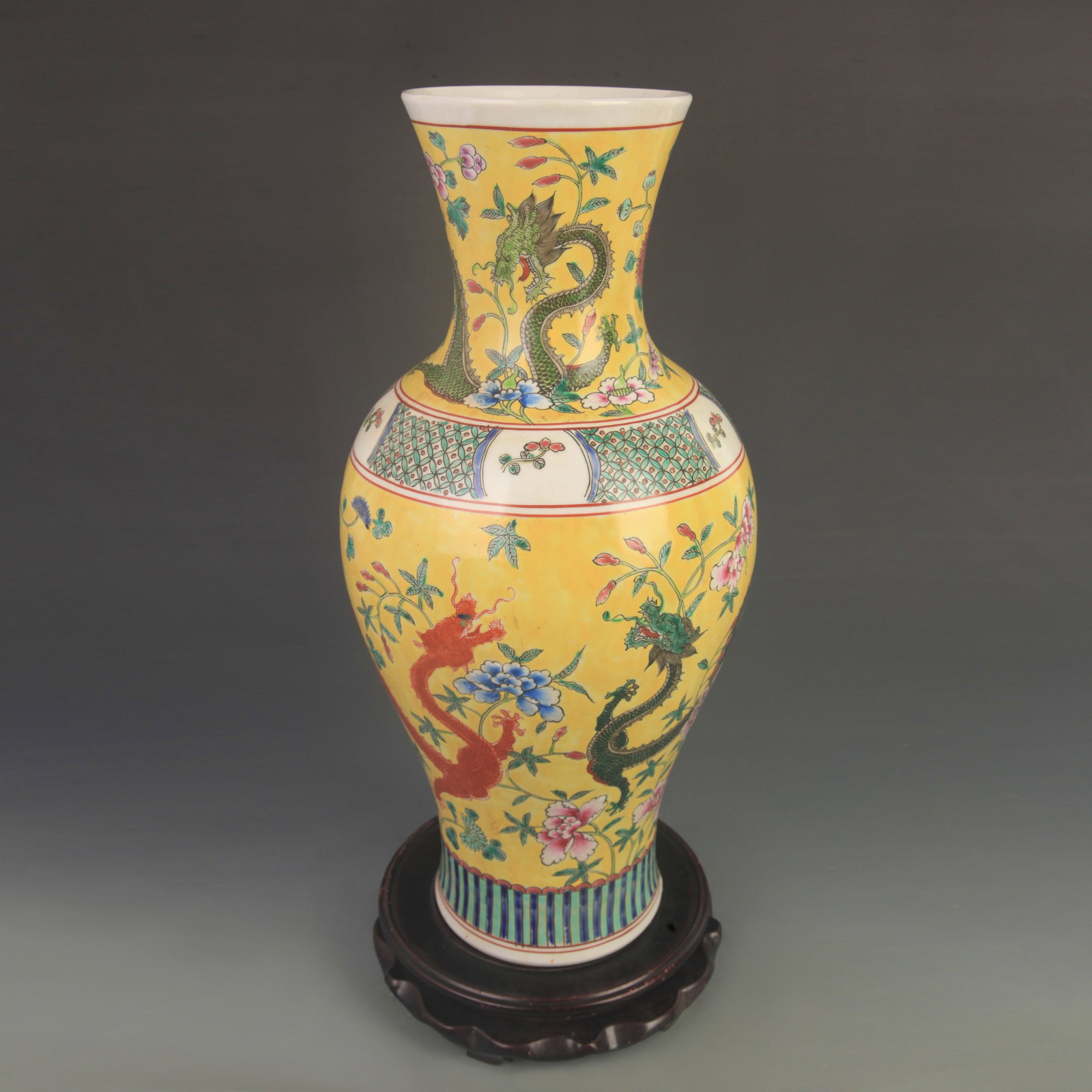 FAMILLE ROSE LARGE YELLOW-GROUND DOUBLE DRAGON VASE: Qing Dynasty Yong Zheng Period; High: 17.0 inch; Diameter:7.20 inch ; wooden base for picture and display purpose only.