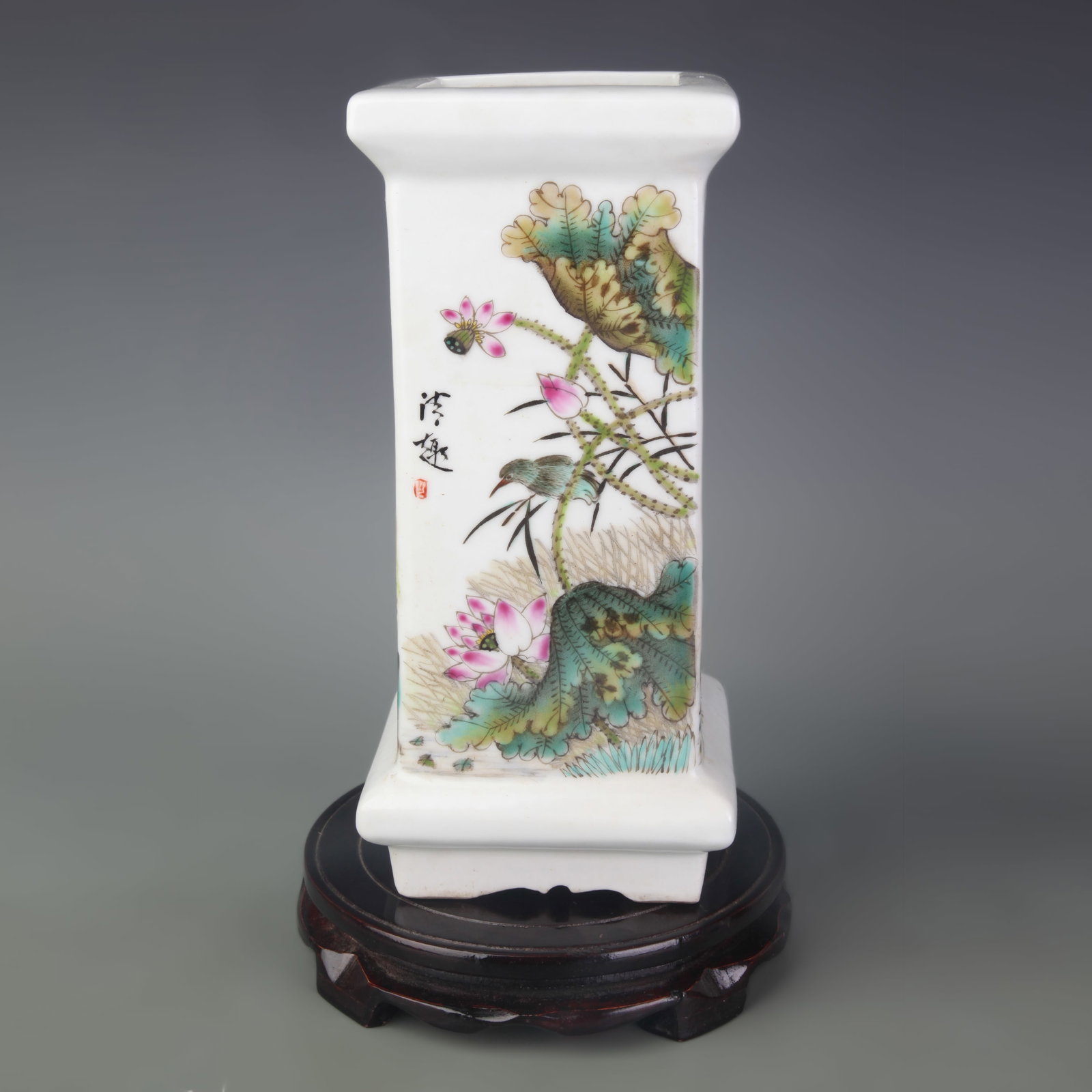 A FAMILLE ROSE SQUARE VASE WITH BIRD-AND-FLOWER DECORATION: Qing Dynasty; Width: 4.8 inch; High: 10.5 inch; wooden base for picture and display purpose only.