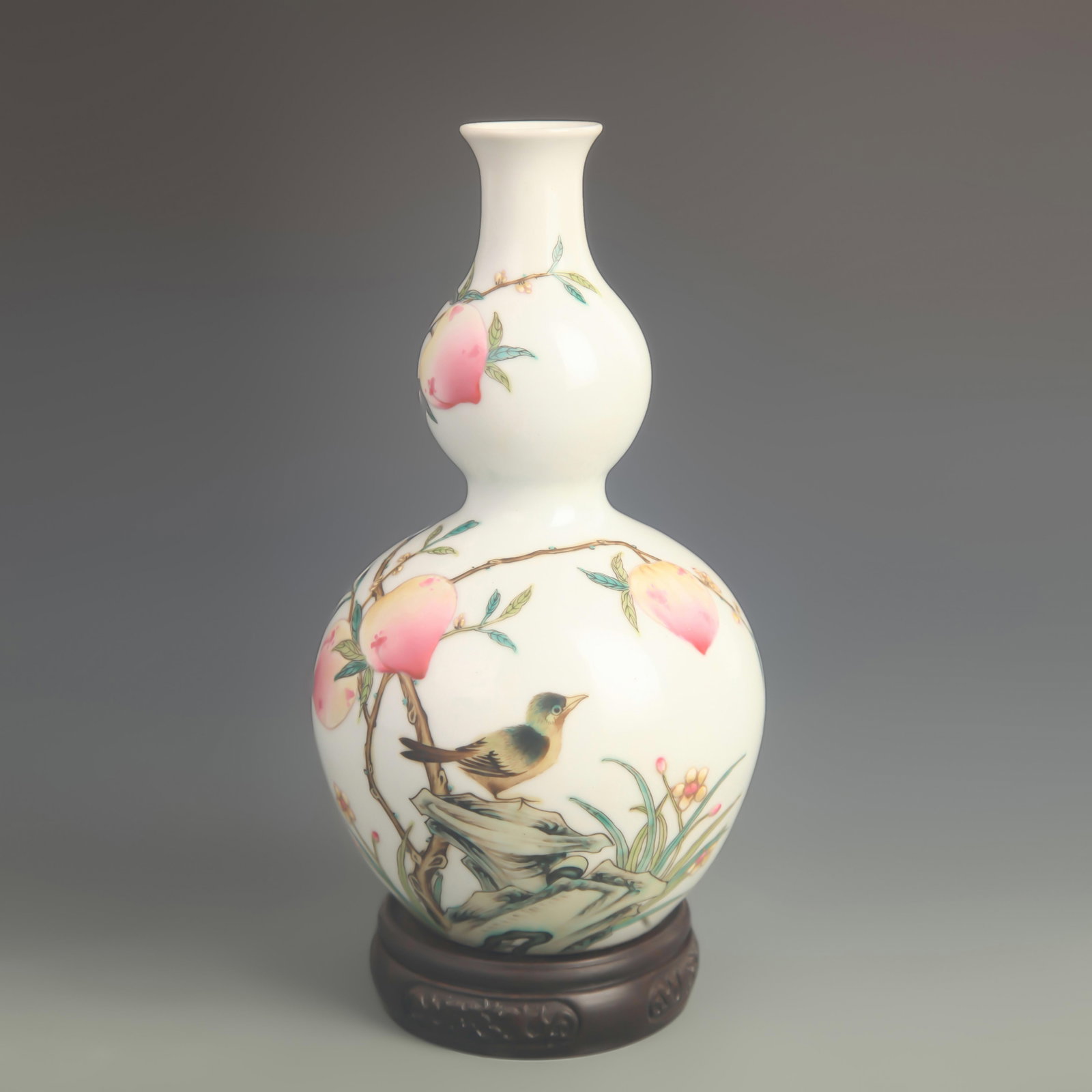FAMILLE ROSE GOURD SHAPED VASE WITH LONGEVITY PATTERN: Qing Dynasty Qianlong Period; High: 9.30 inch; Diameter: 4.70 inch; wooden base for picture and display purpose only.