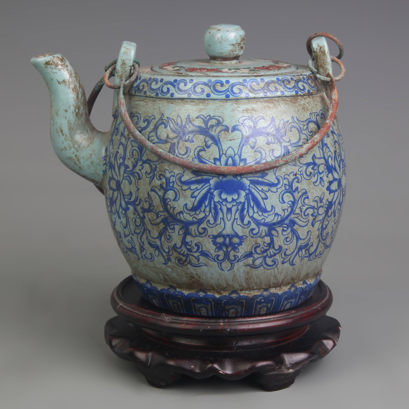ZISHA TEAPOT WITH POLYCHROME DECORATION, SHI DABIN MARK: 20th Century; Diameter: 3.6 inch; Width: 6.6 inch; High: 8.0 inch; wooden base for picture and display purpose only.