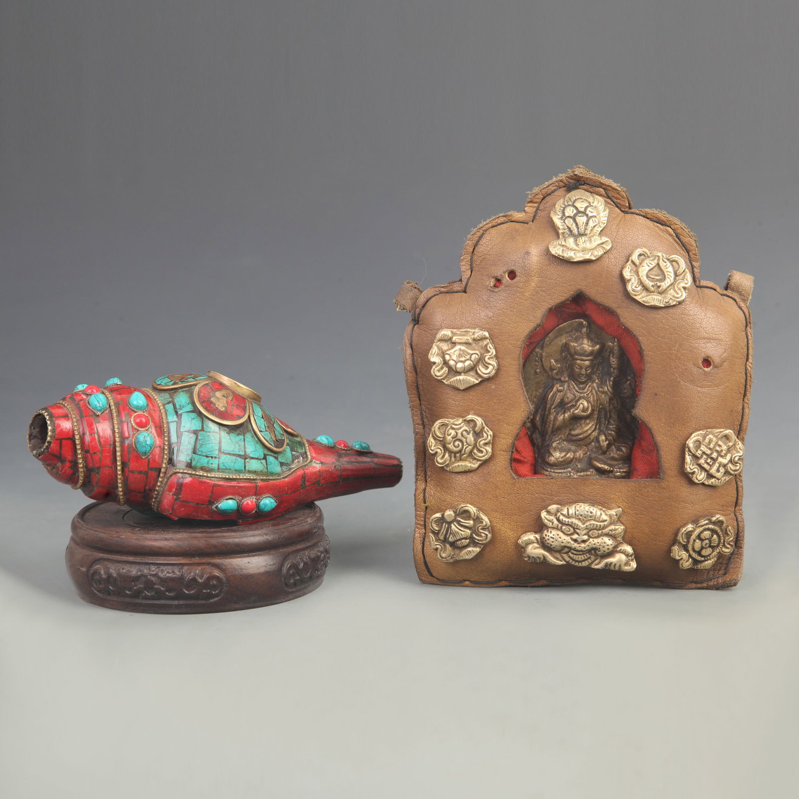 SET OF TIBETAN BUDDHISM RITUAL INSTRUMENTS IN A CONCH AND MANTRA: 20th Century; High: 6.00 inch; Width: 5.00 inch; Width: 2.50 inch; Long: 6.25 inch; wooden base for picture and display purpose only.
