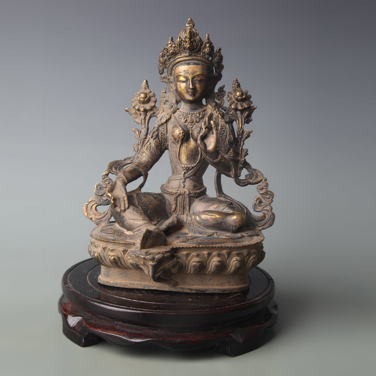A GILT-BRONZE FIGURE OF GREEN TARA: Qing Dynasty; High: 8.2 inch; wooden base for picture and display purpose only.