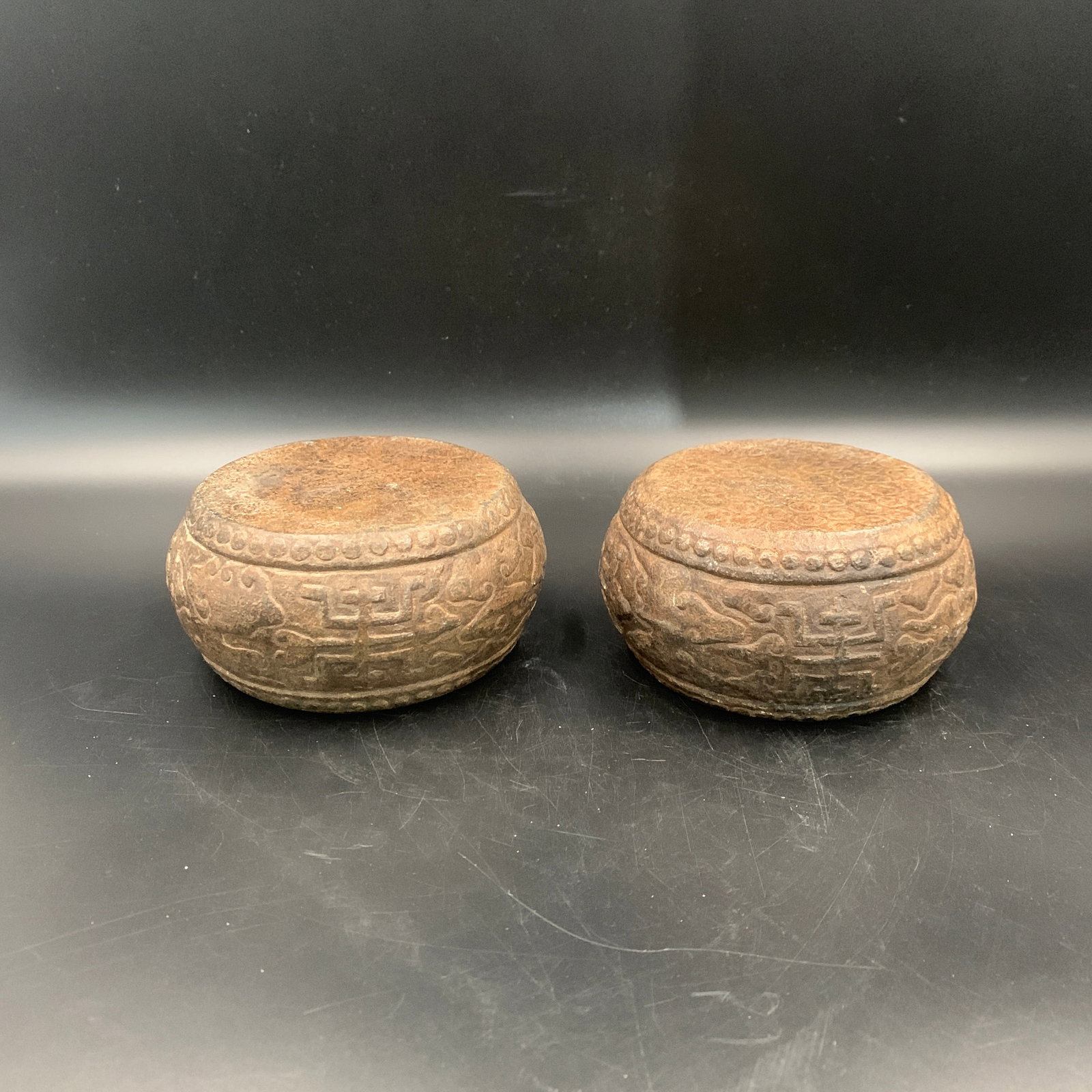 PAIR OF CARVED STONE CLOUD-SCROLL PATTERN BASES - 3