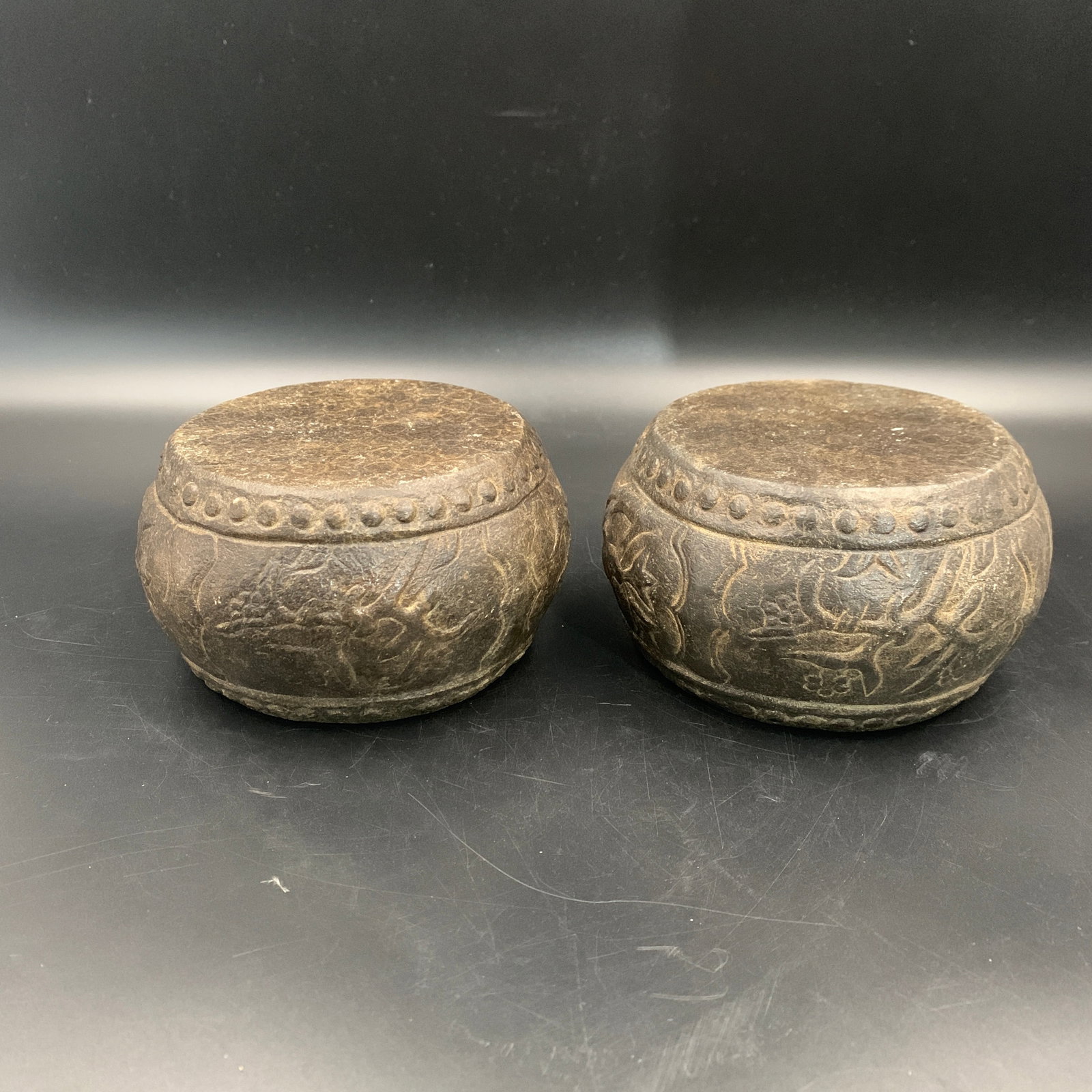 PAIR OF CARVED STONE CLOUD-SCROLL PATTERN BASES - 2